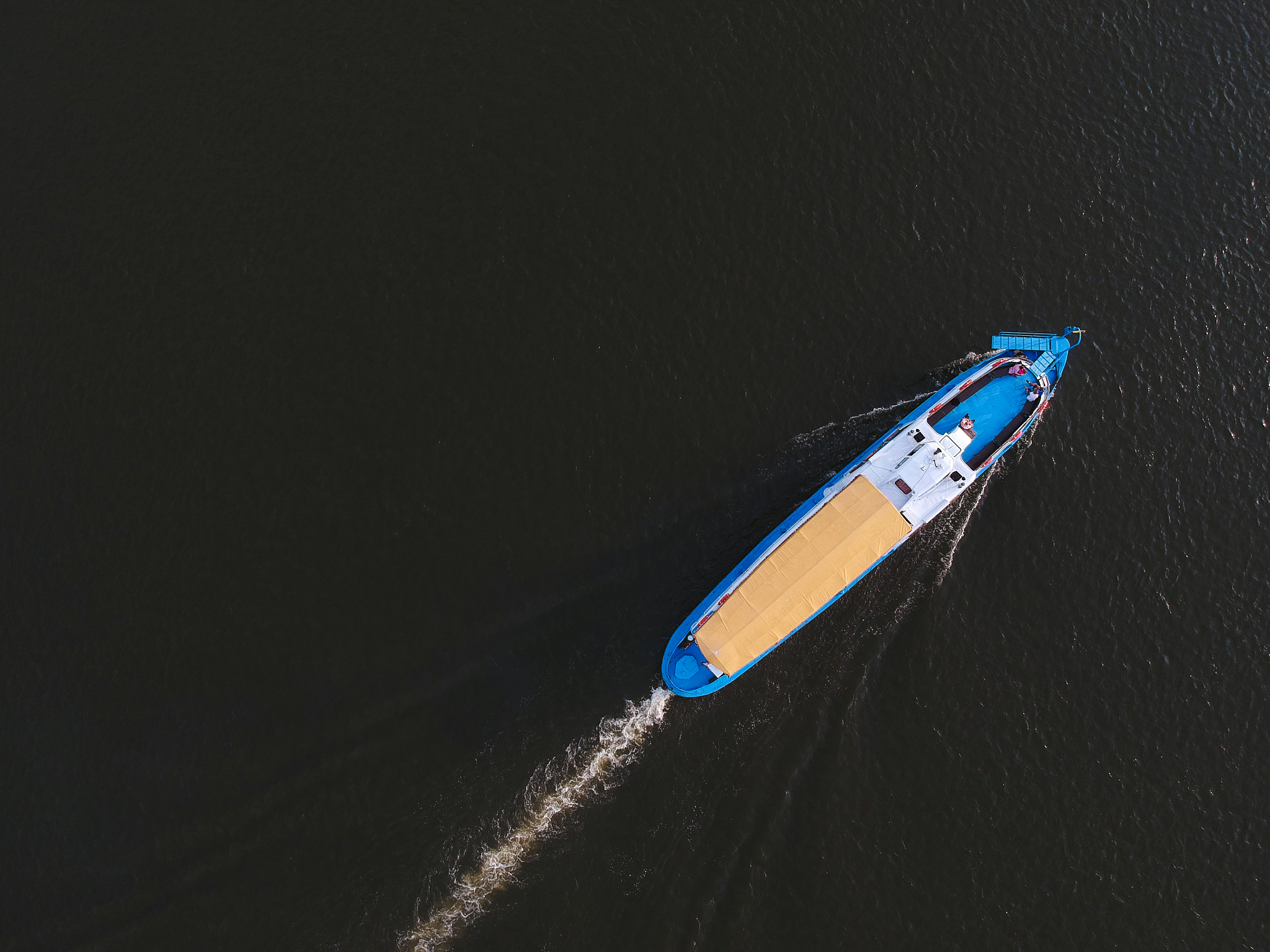 view from the height of a floating ship on the river, around the