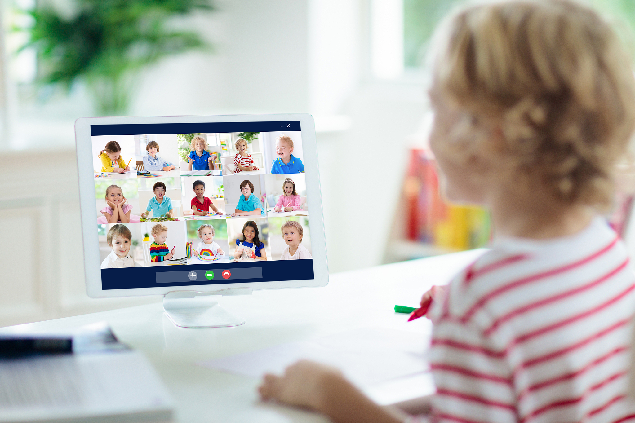 online remote learning. school kids with computer.