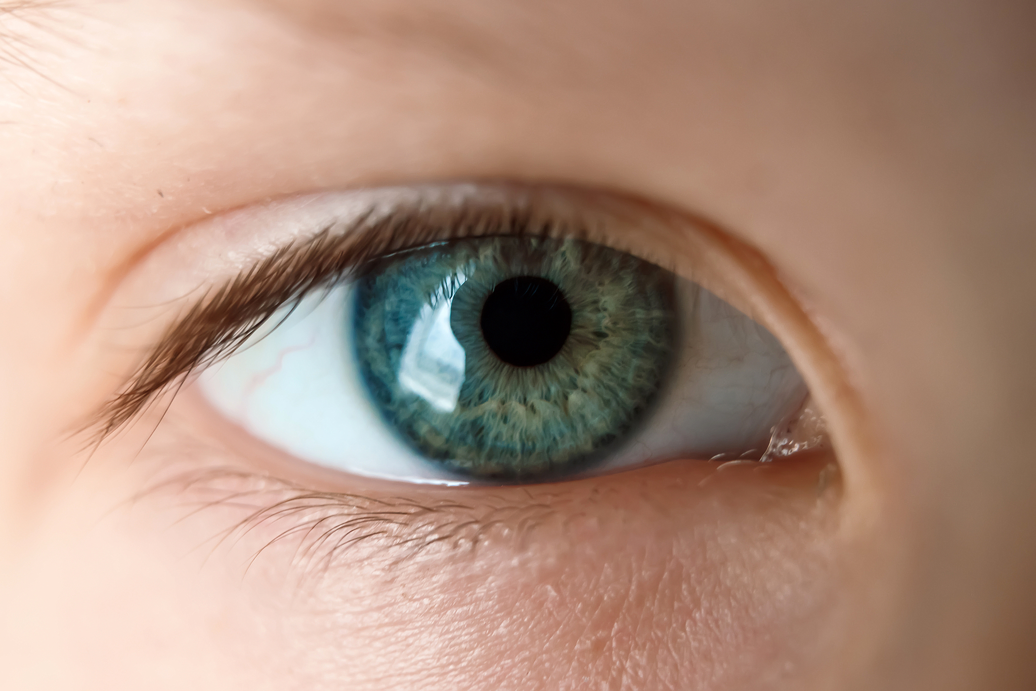 baby's eye is blue, close-up.