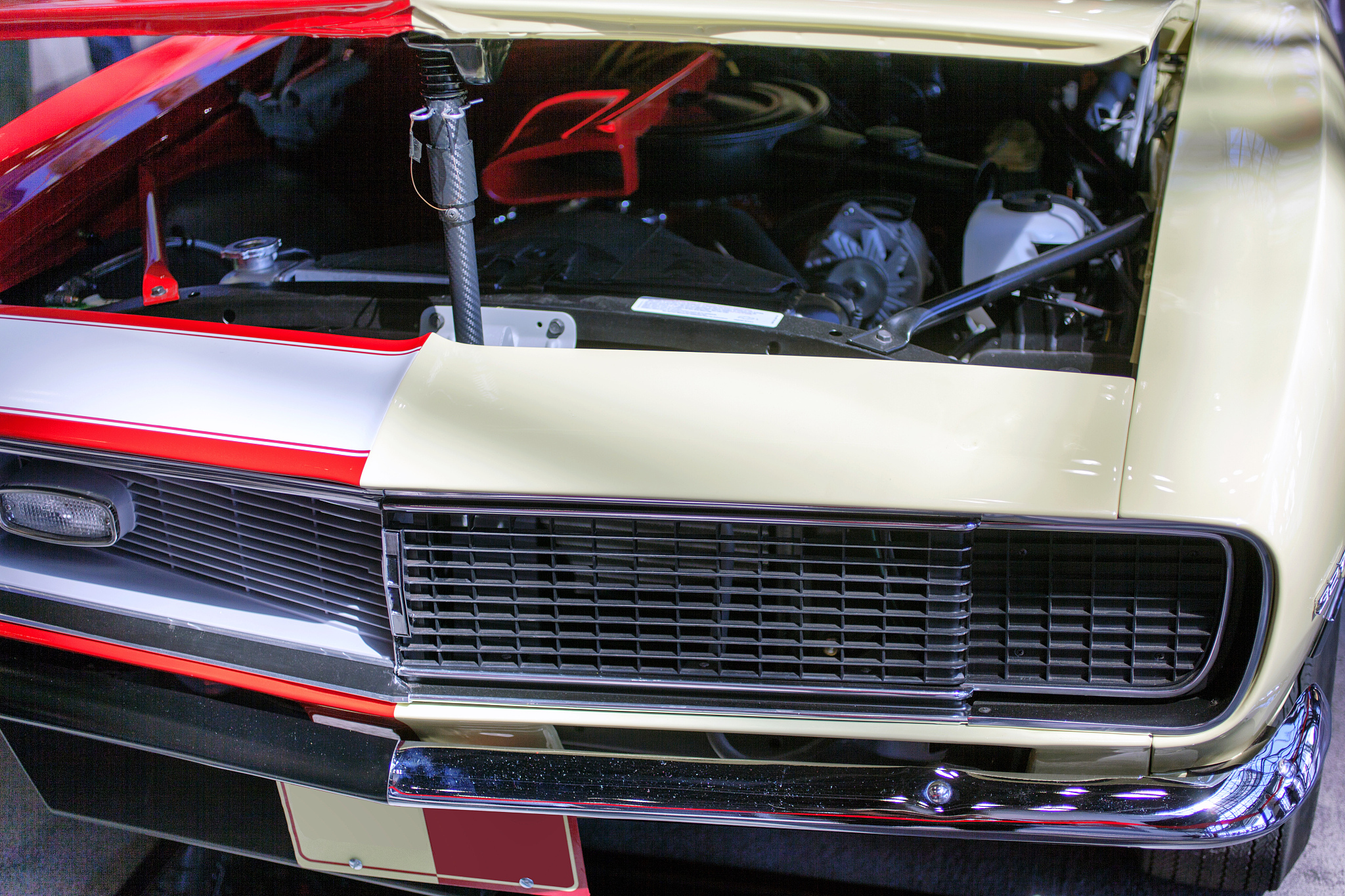 a vintage classic american car painted in two different colors h