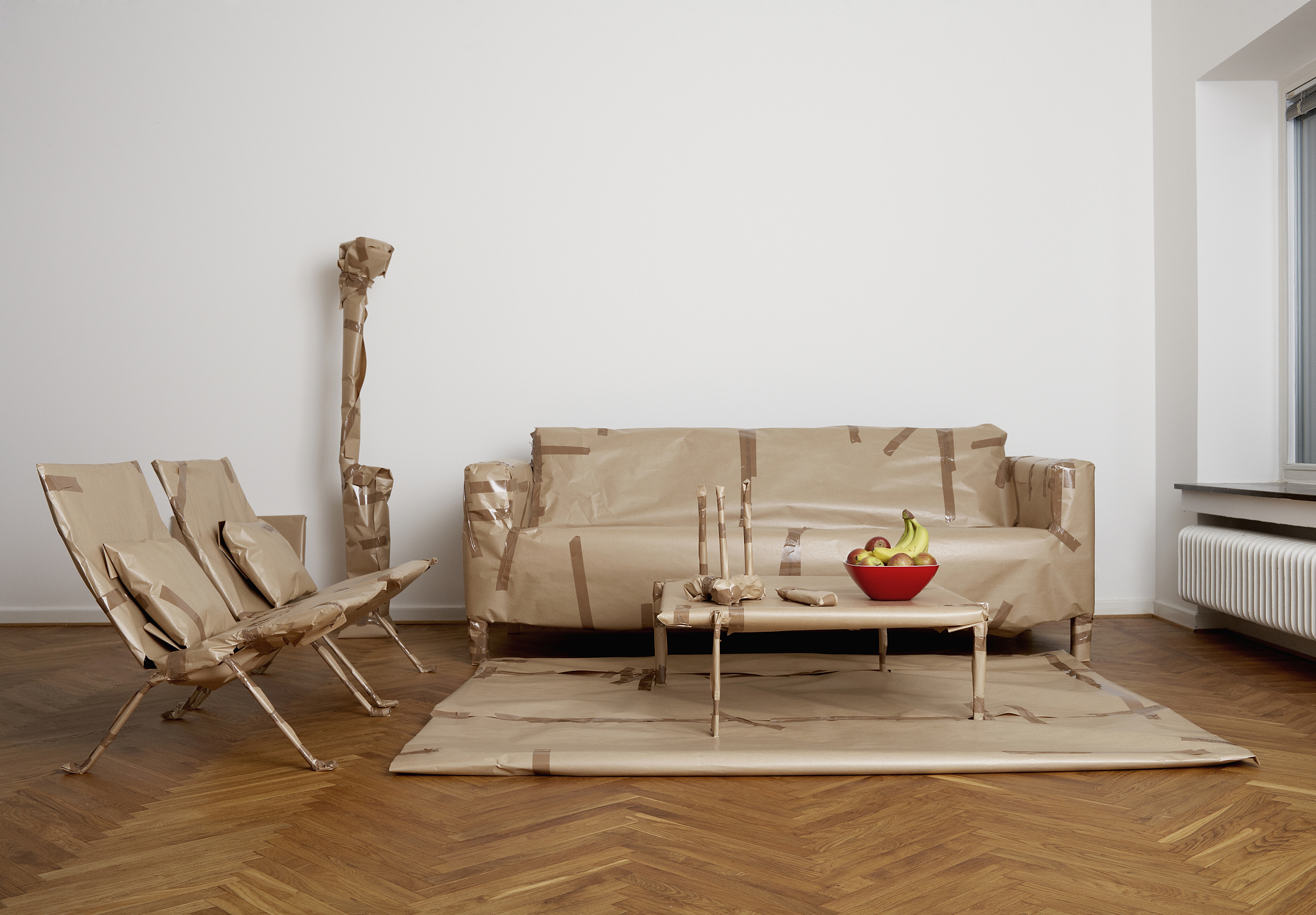 furniture that has been wrapped up in a living room sweden.