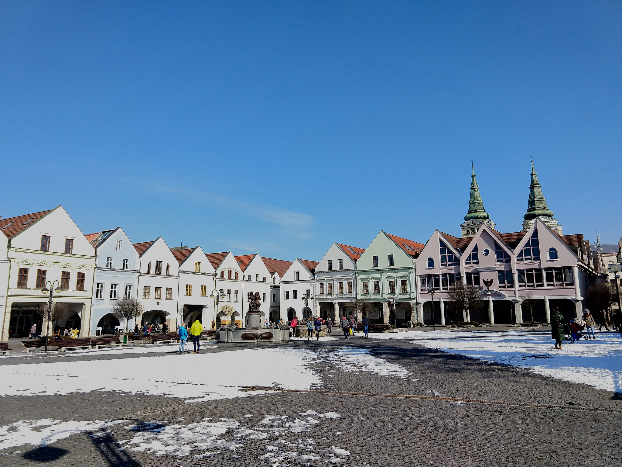 building, church and town during sunny day with clouds on sky.