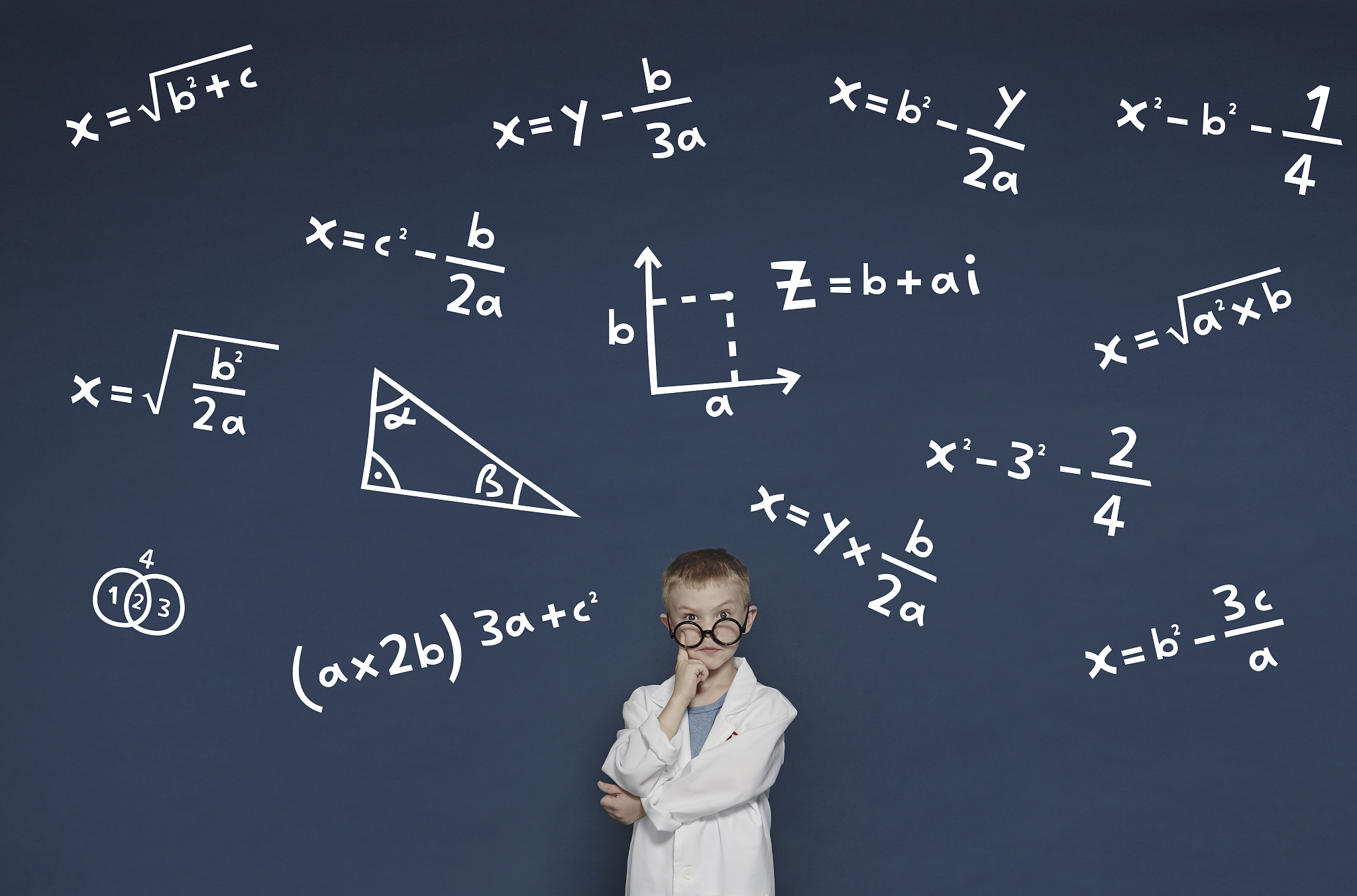 boy with mathematical equations