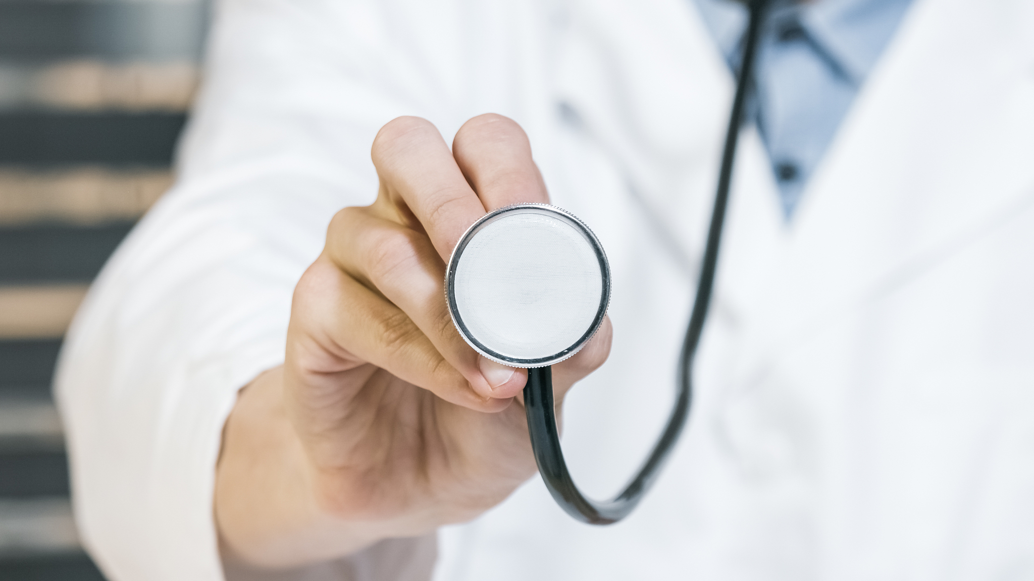 doctor using stethoscope