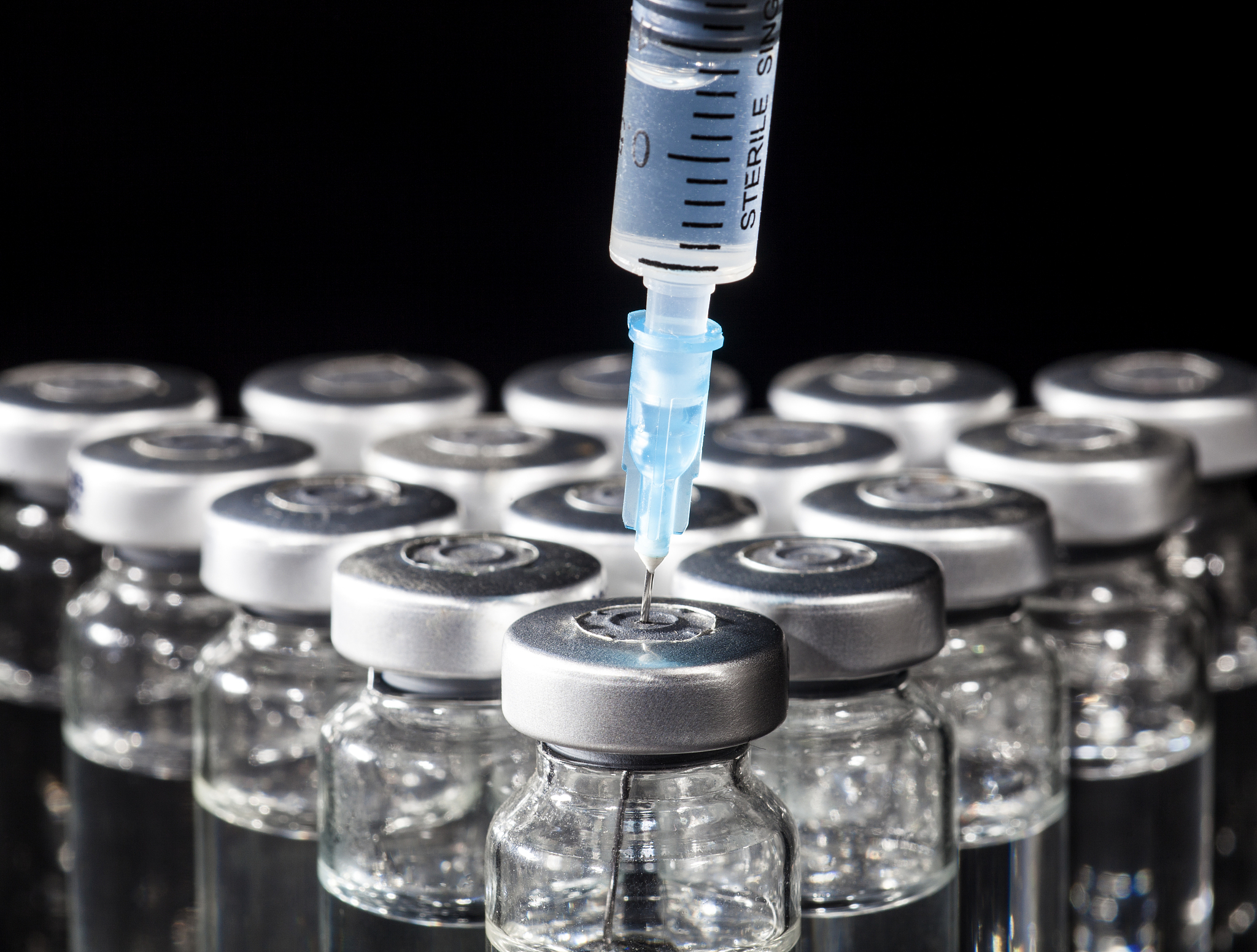 glass medicine vials and syringe