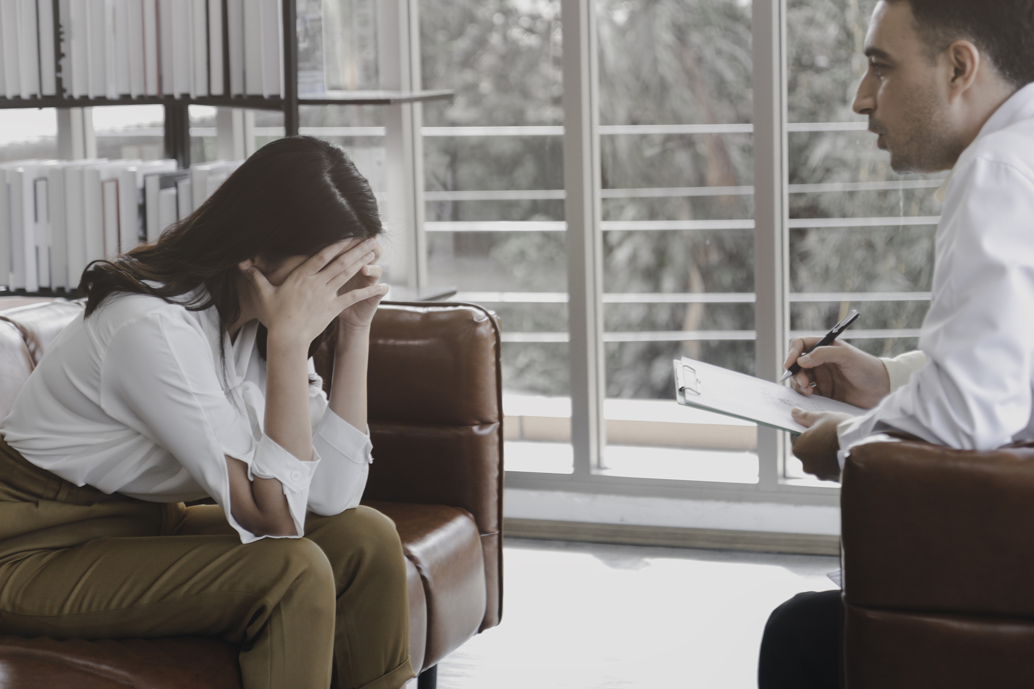 depressed patient having consultation with psychiatrist doctor, 