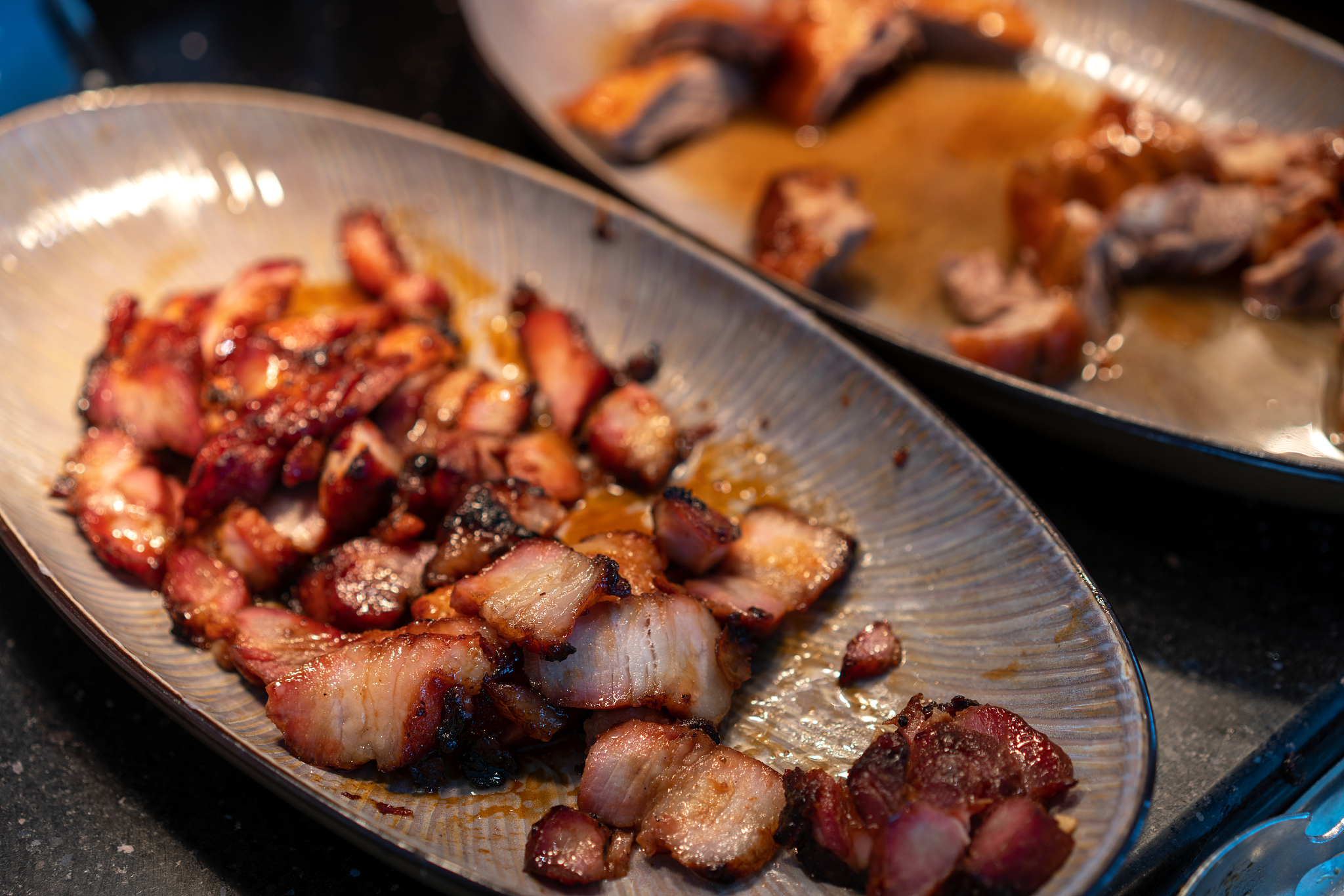 char siu on the plate, in a buffet restaurant