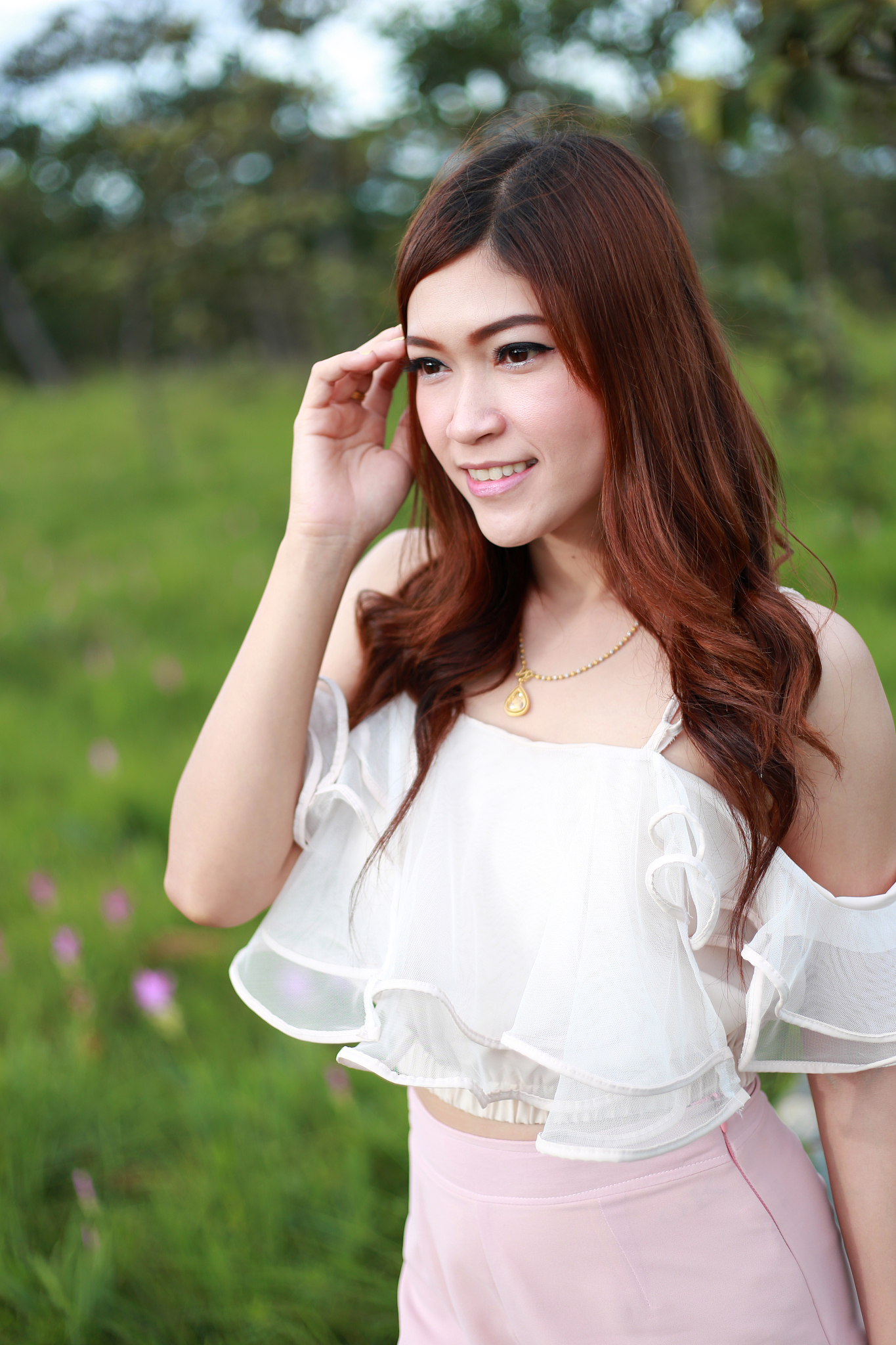 pretty asian woman in siam tulip flower field