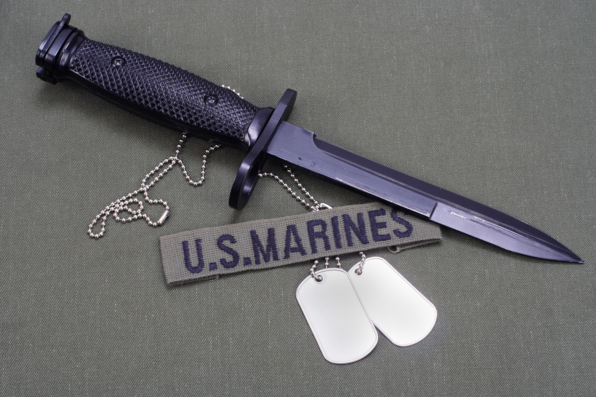 bayonet and dog tags on us marines uniform