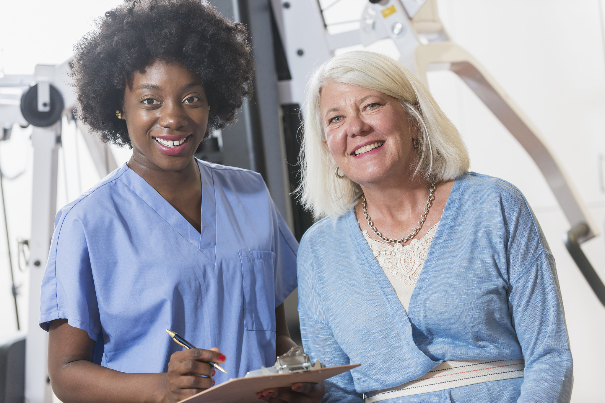 physical therapist working with a female patient