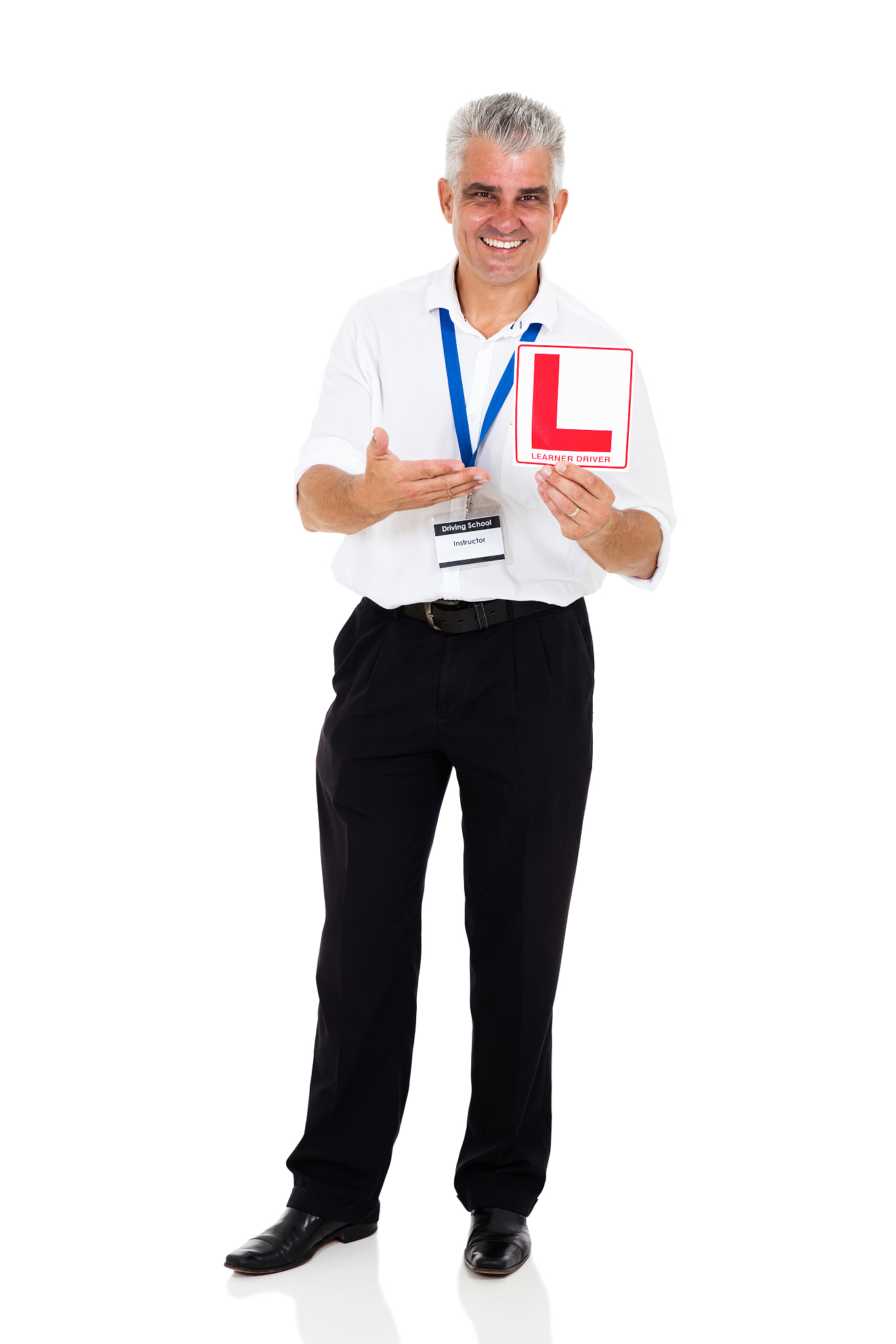 senior driving instructor showing learner driver sign