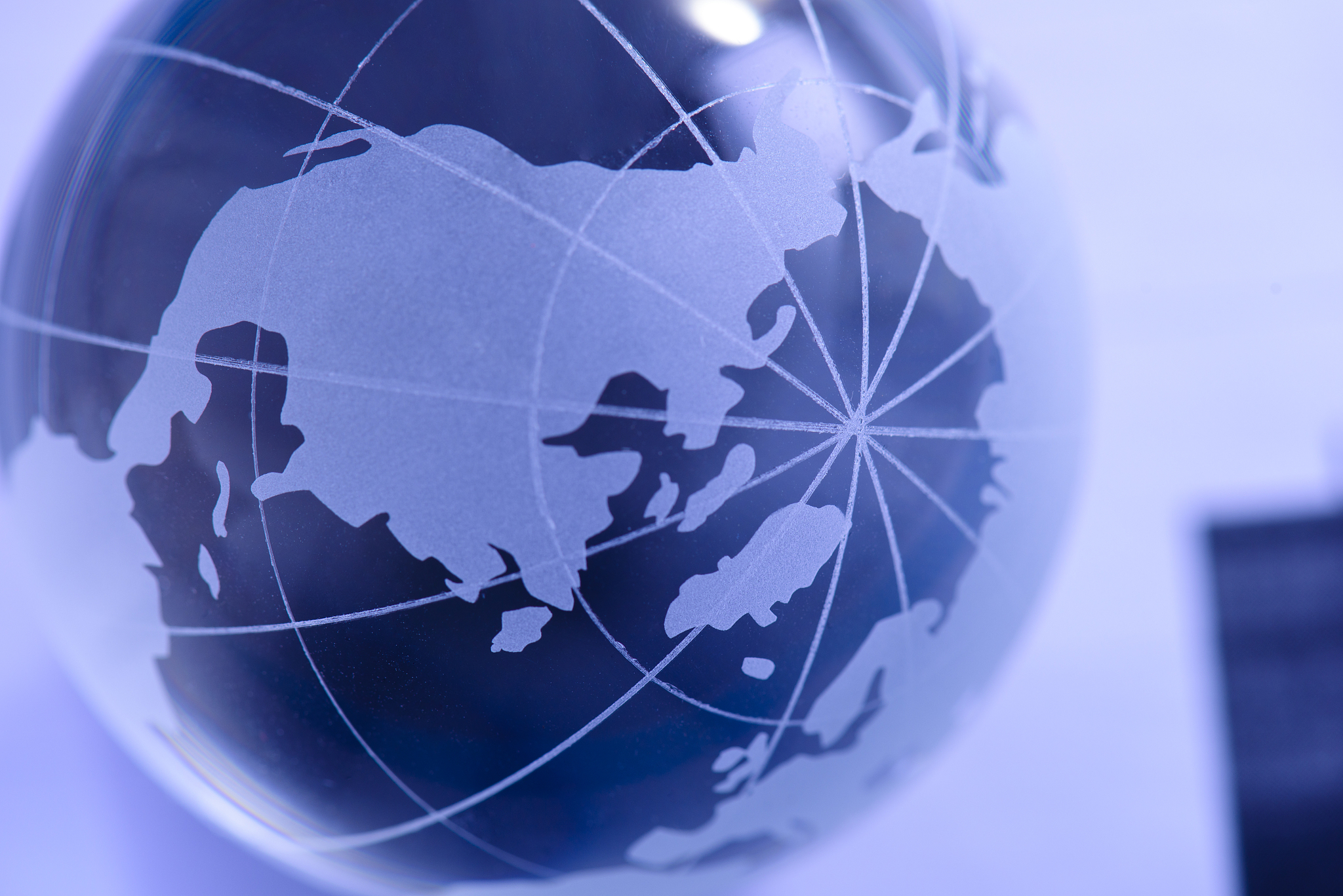 glass globe on financial balan