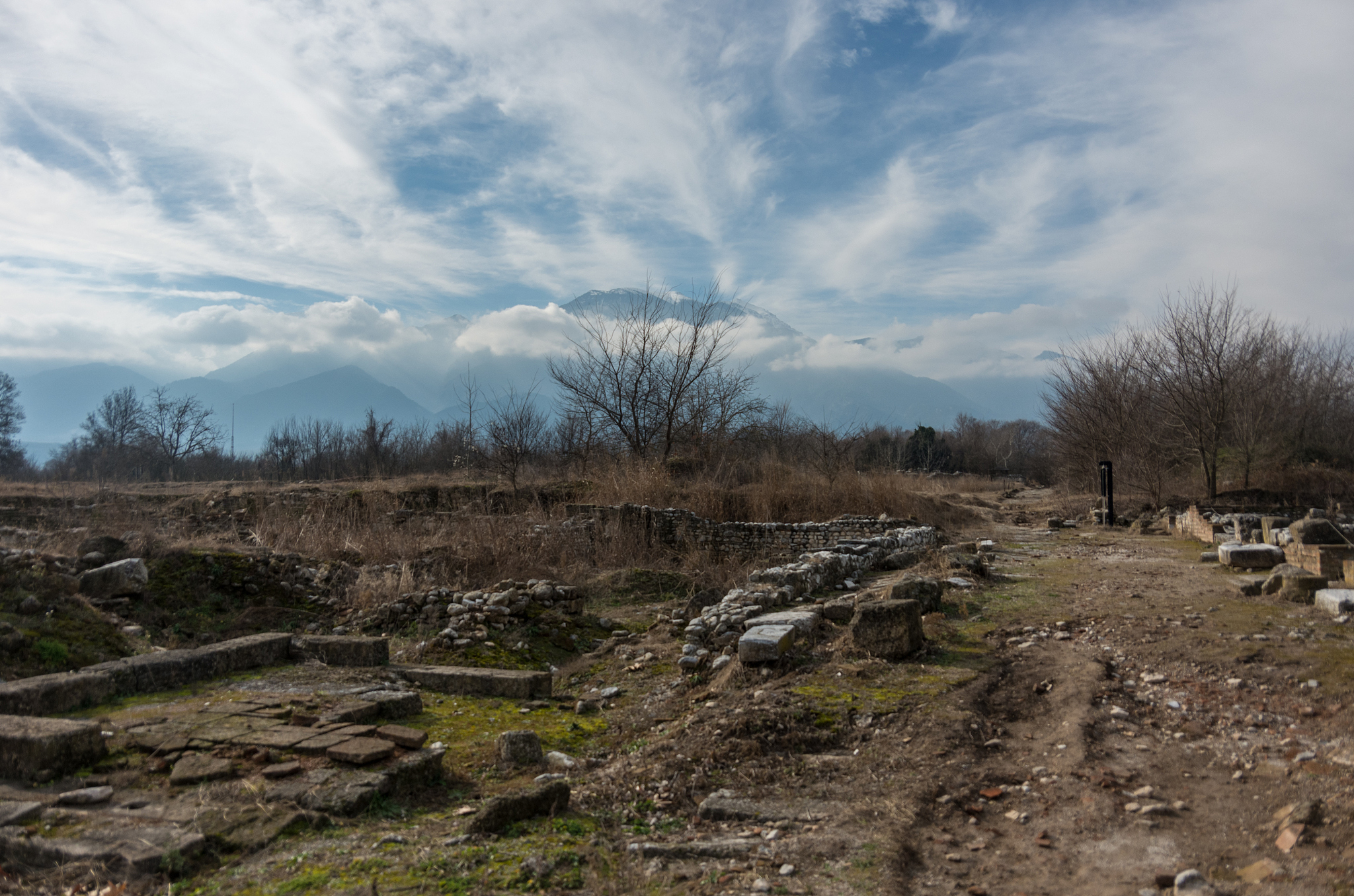 ruins of building at dion archaeological site with olympus mount