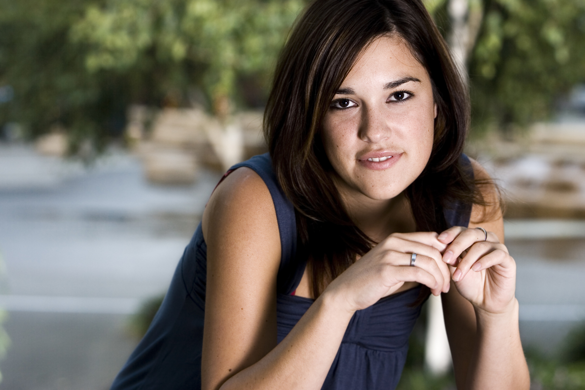 beautiful latina young woman portrait outside, copy space