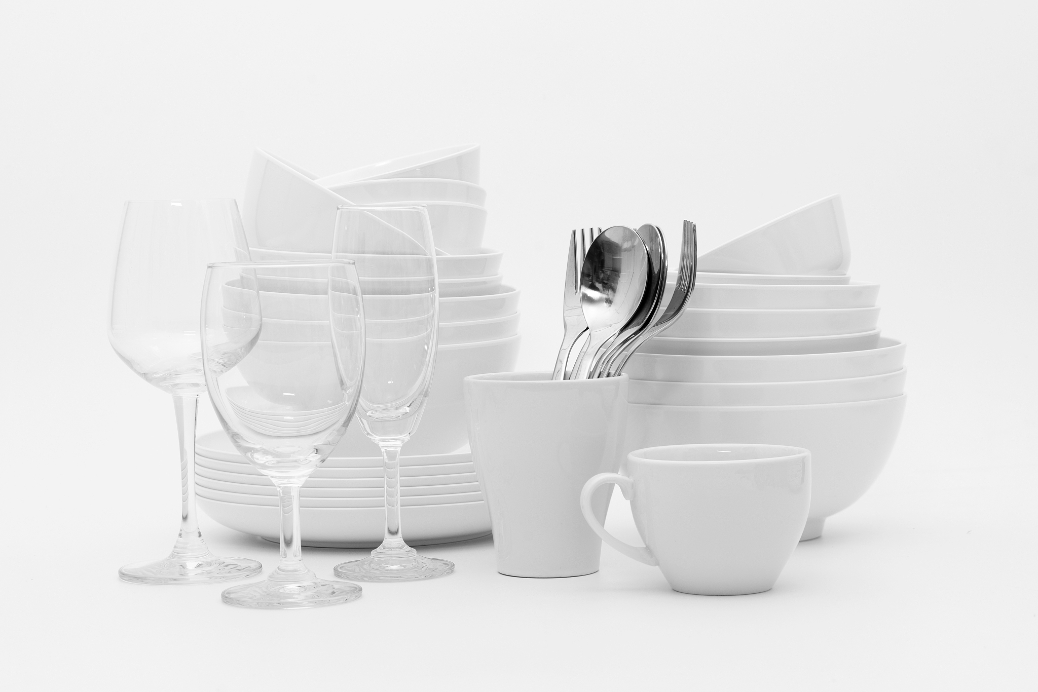 set clean dishes glasses on white background