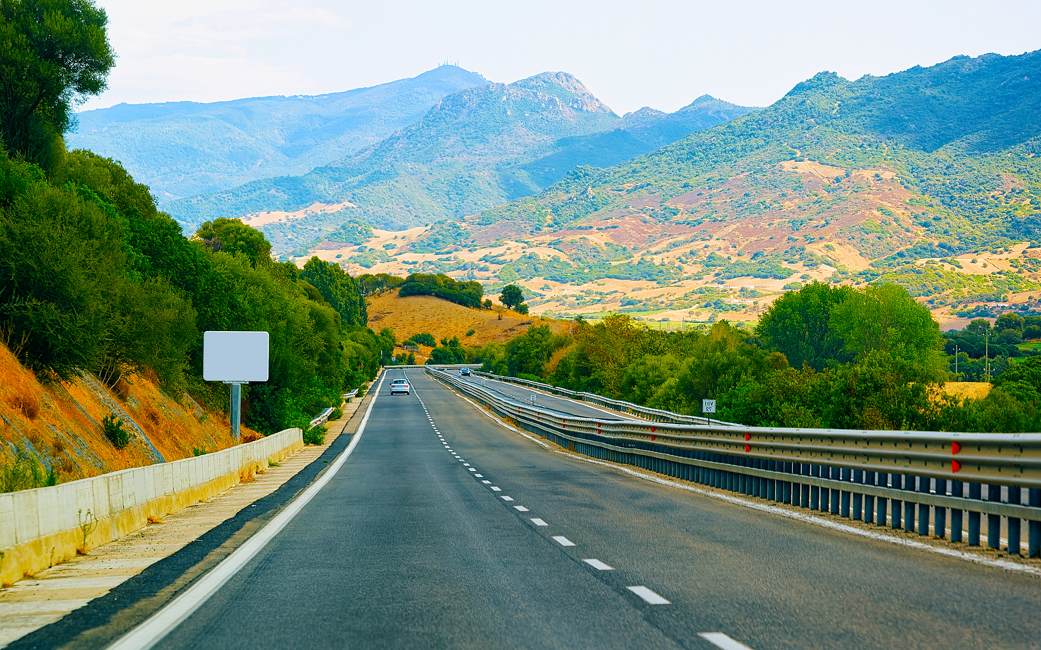 empty road without cars on sardinia island in italy reflex