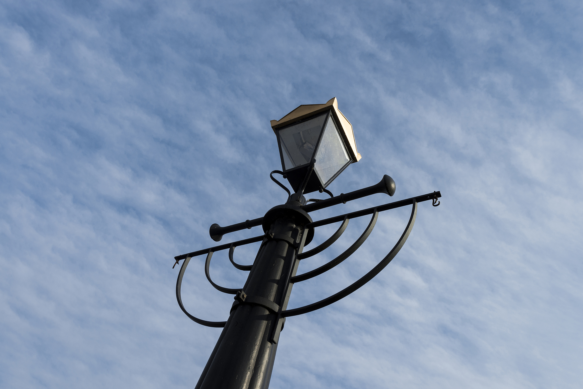 low angle view of street lamp against sky
