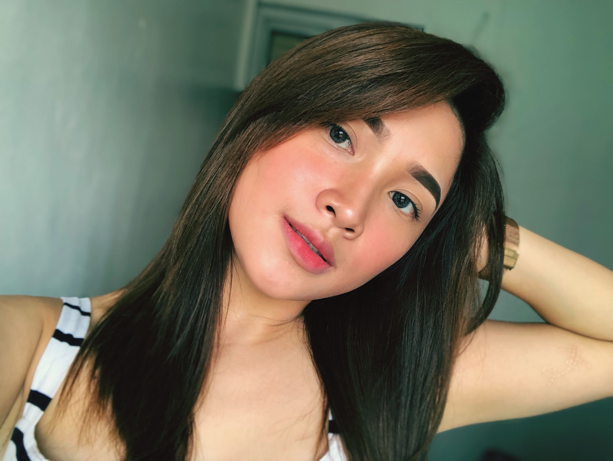 portrait of beautiful young woman at home