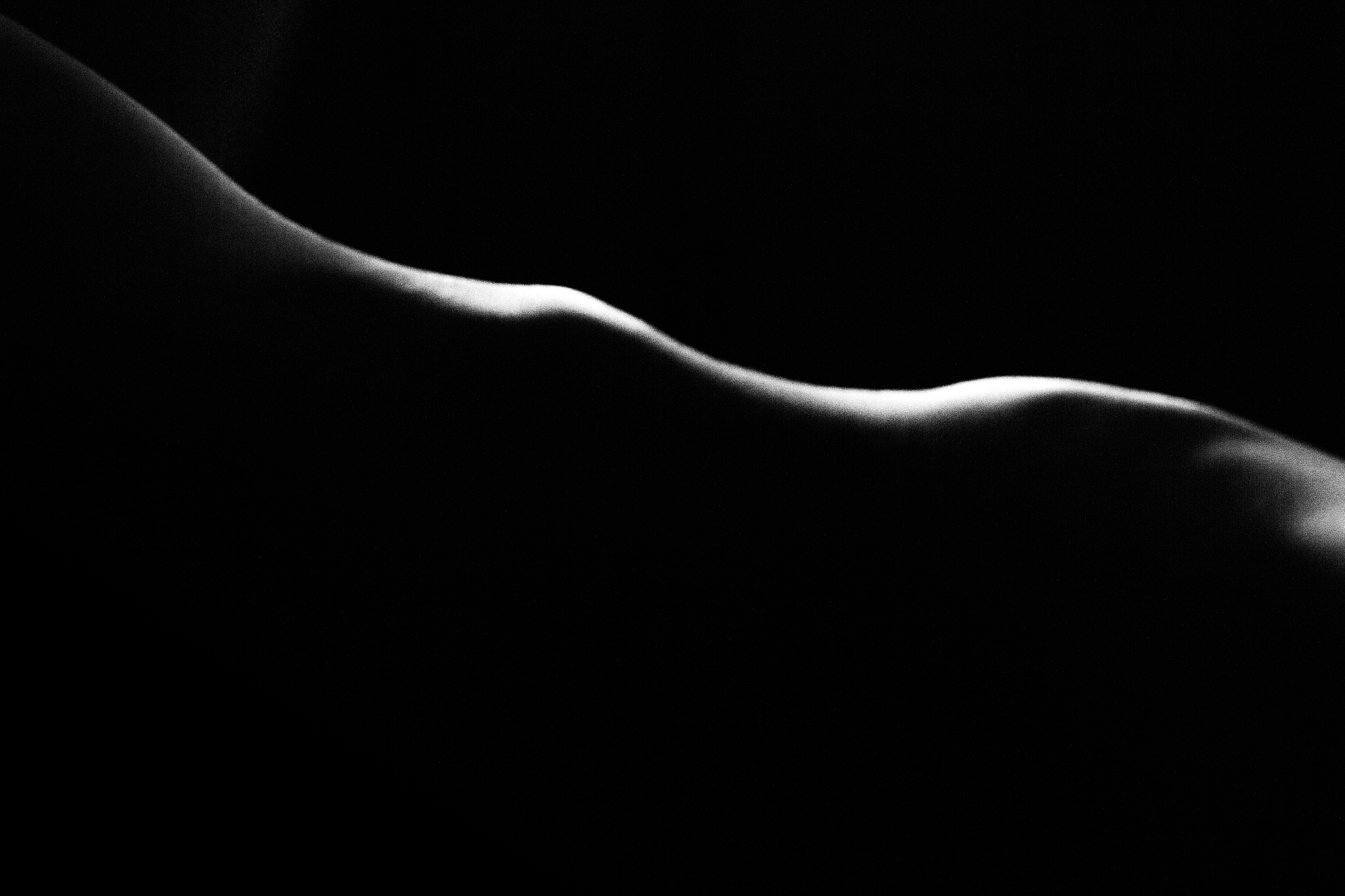 midsection of person against black background