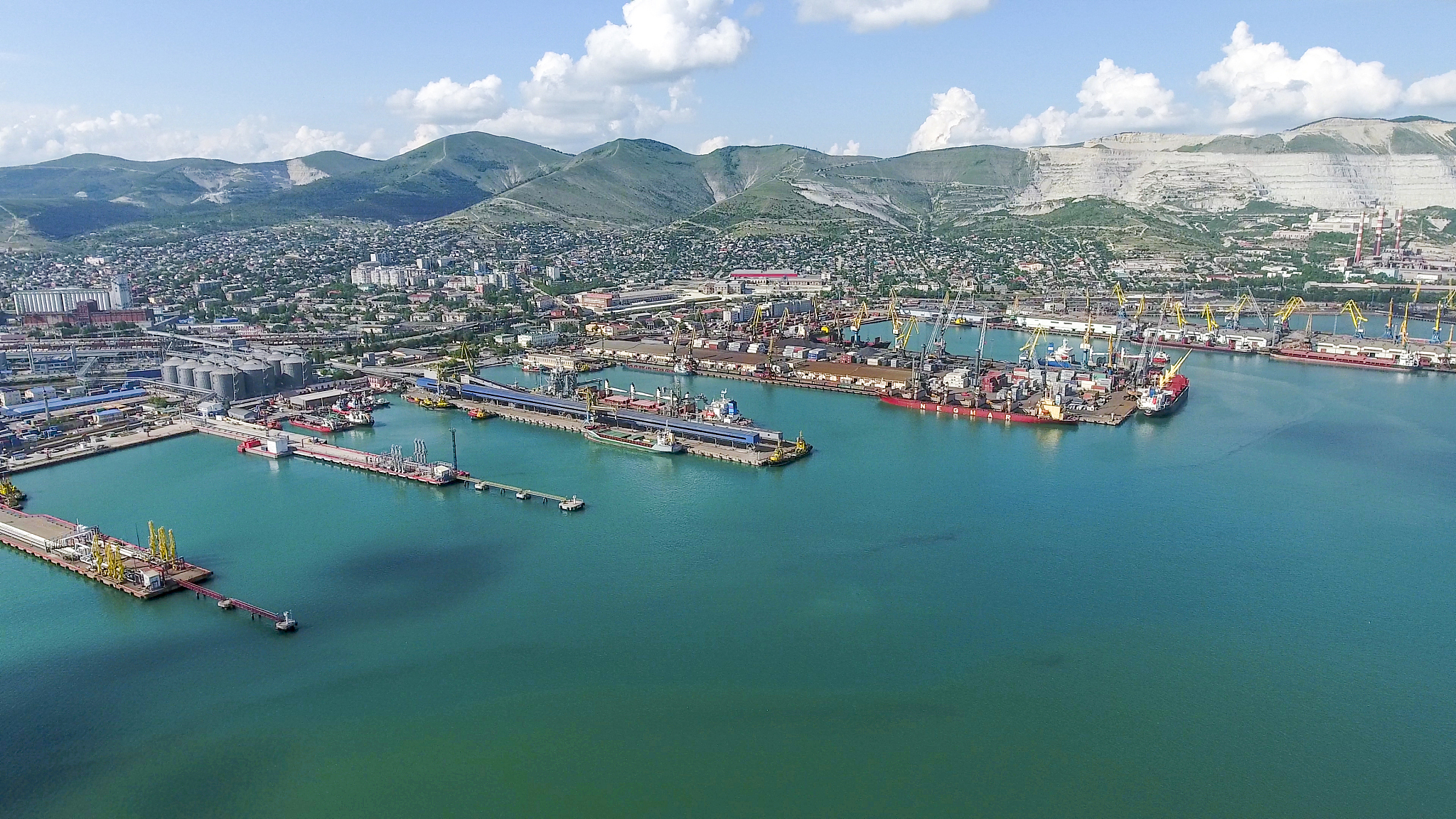 industrial seaport, top view. port cranes and cargo ships and ba