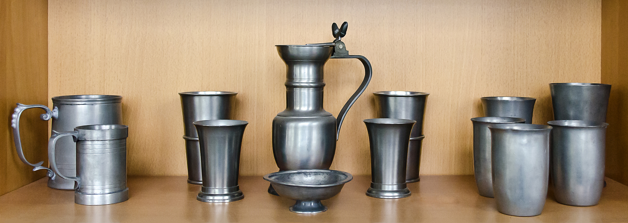 cups and mugs made from tin