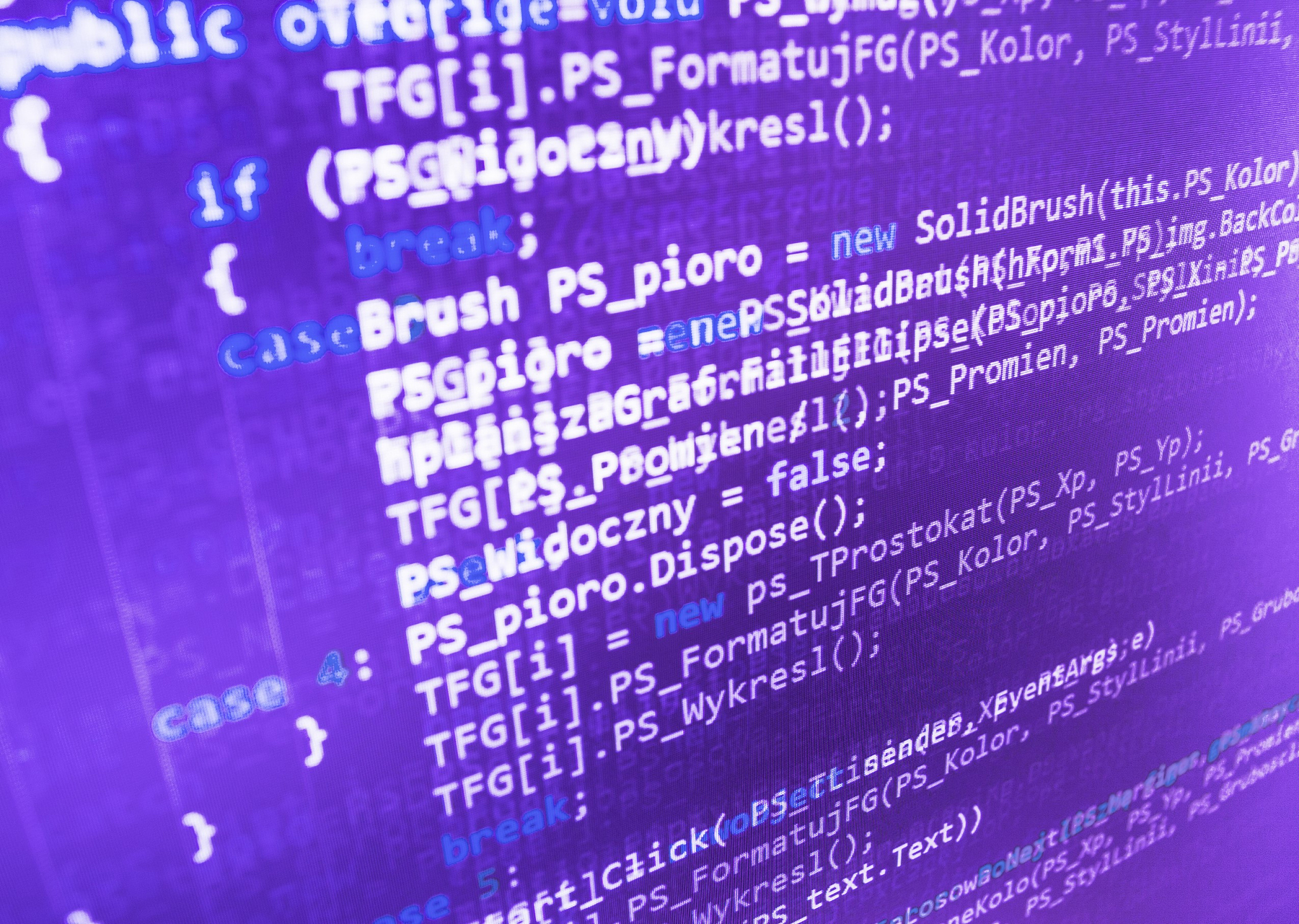 software developer programming code on computer