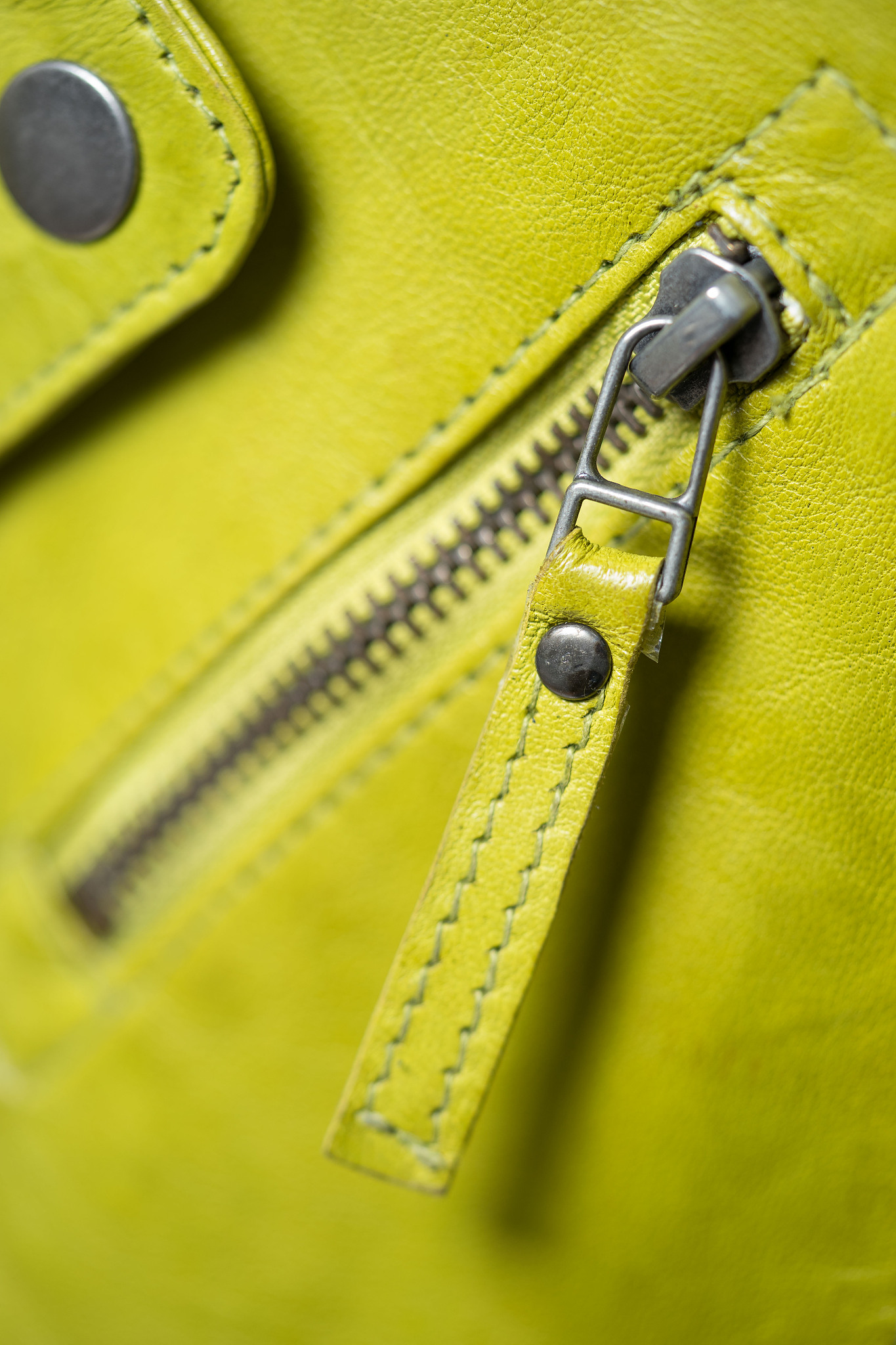 green leather jacket zippers