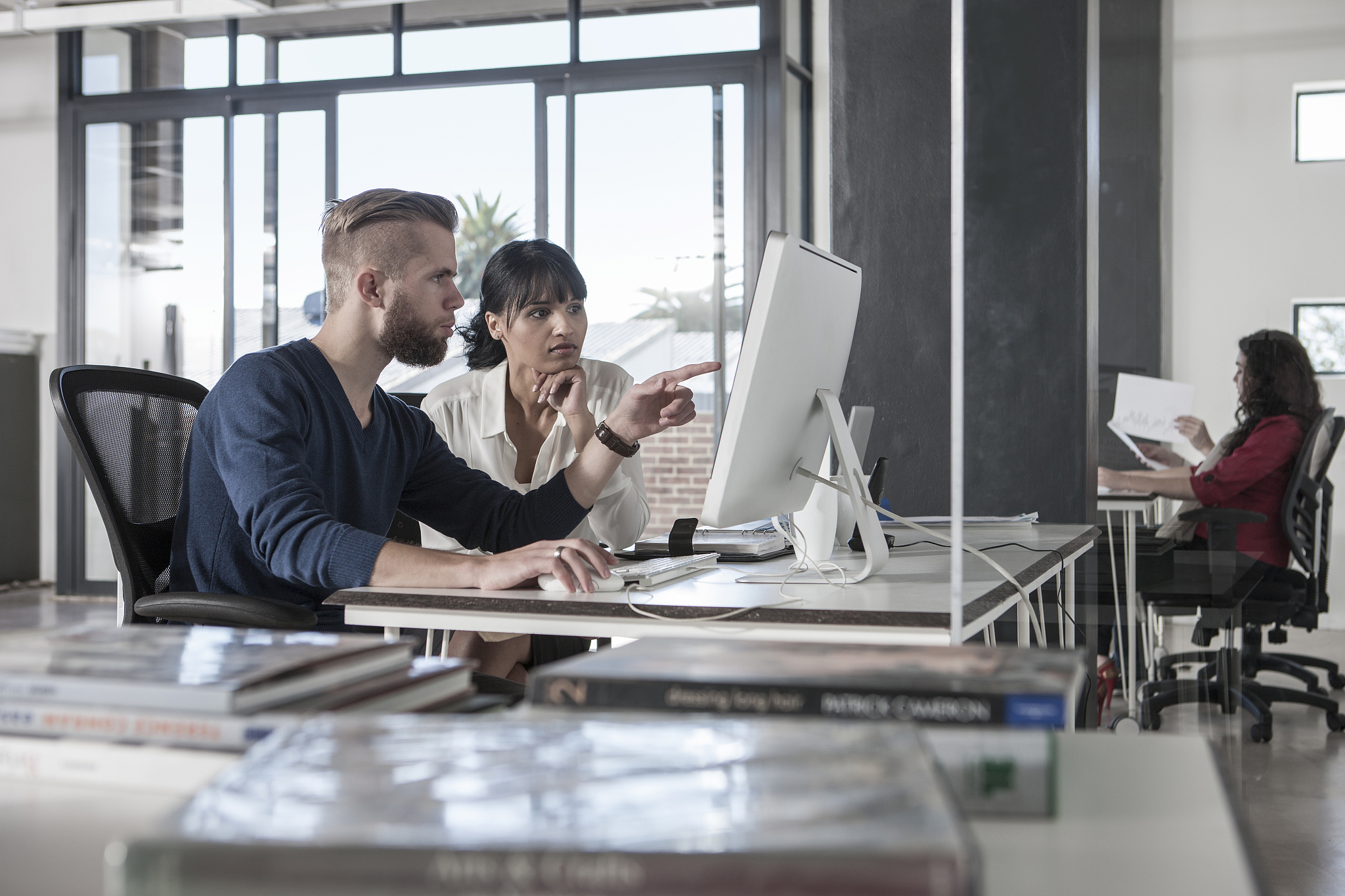 creative professionals working together in office