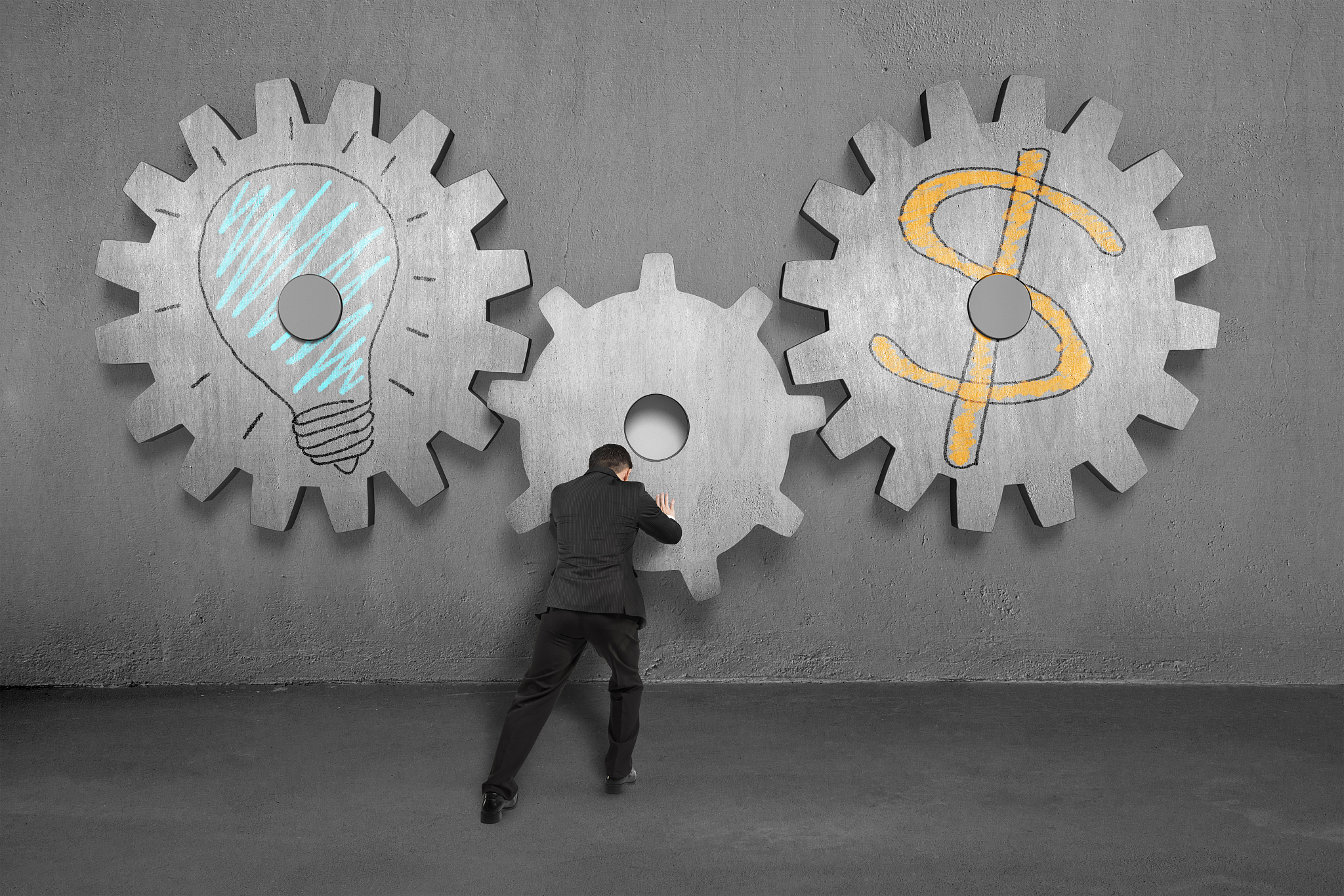 assembling concrete gears with lamp and money symbol