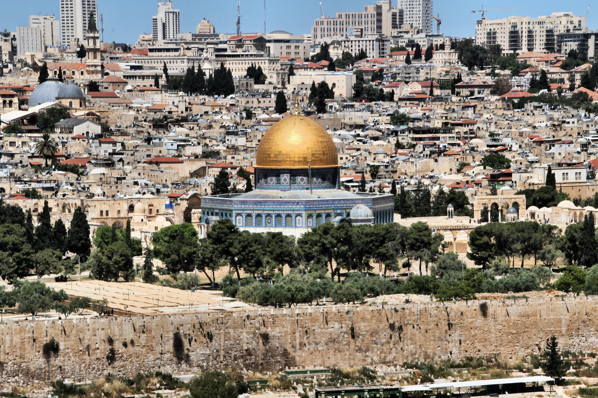 a picture of jerusalem showing the dome of the rock taken from t