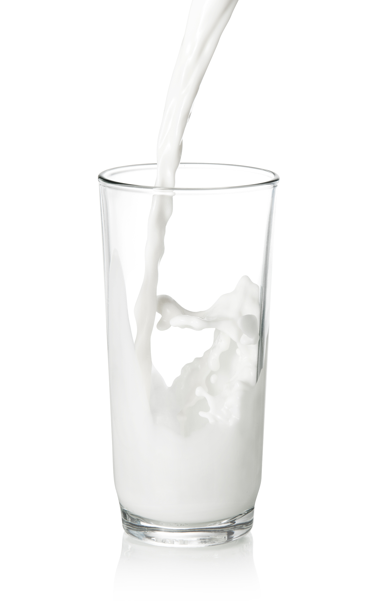 milk pouring in glass