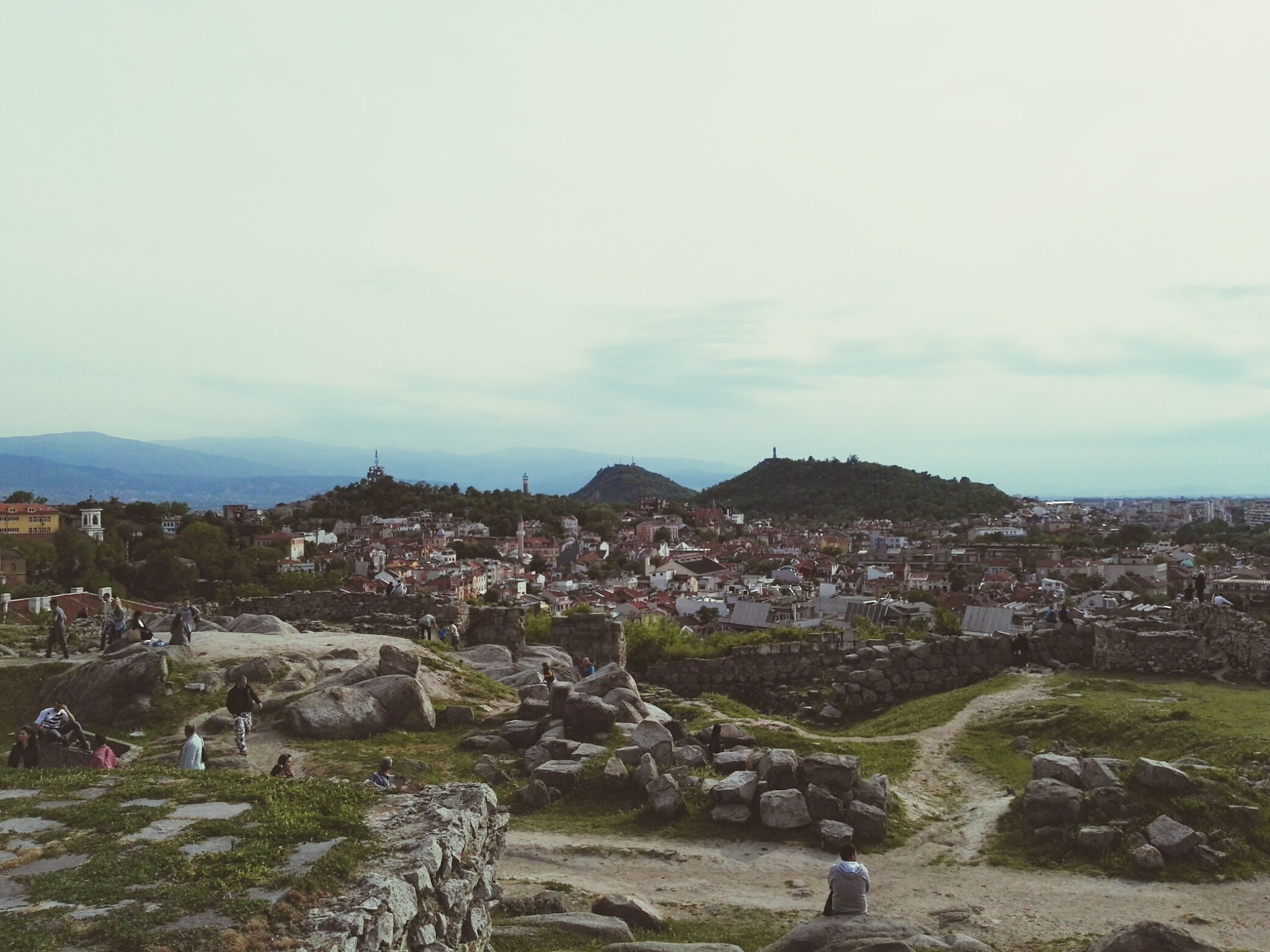 high angle view of town against cloudy sky