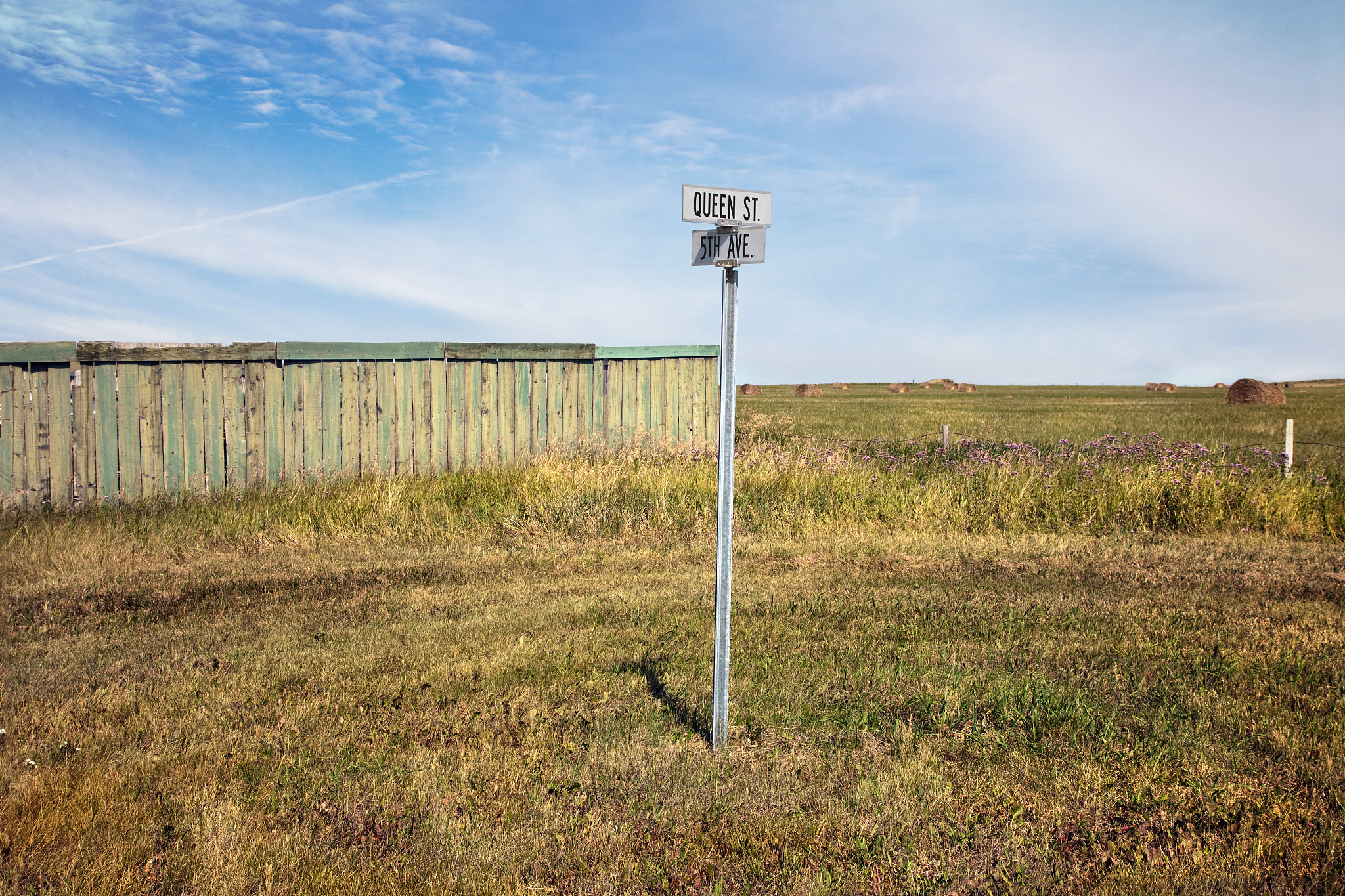 street sign in a field
