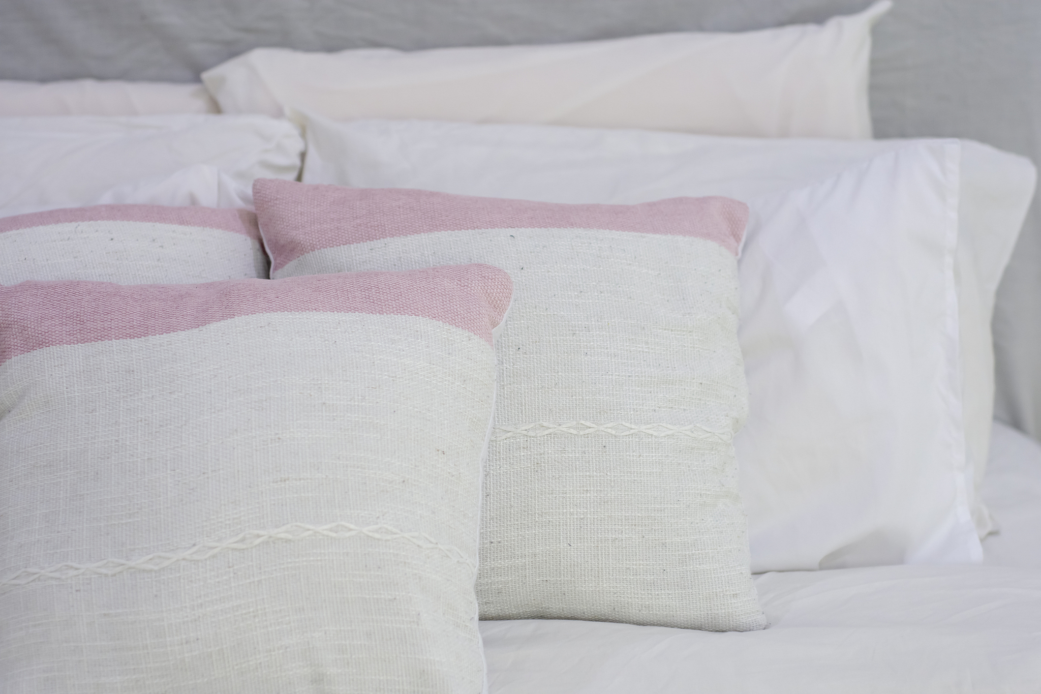 decorative pillow natural fabric on the bed