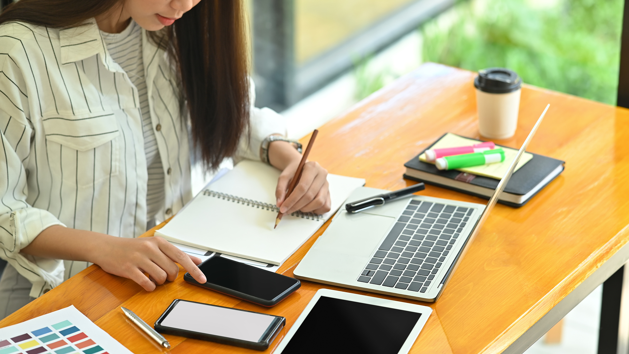 young creative female working on workplace.