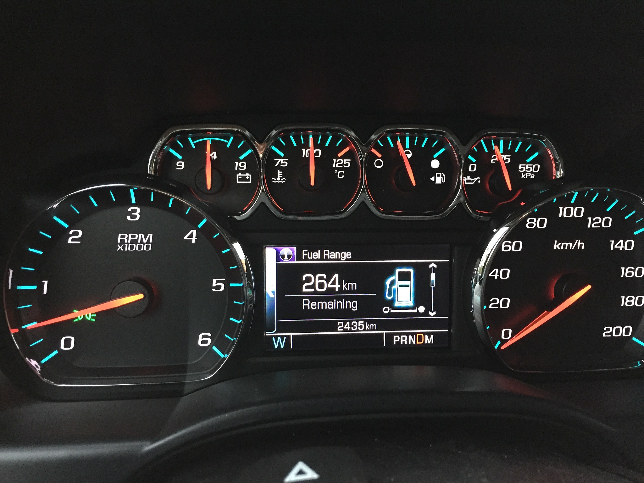 pickup truck dashboard with running engine in drive