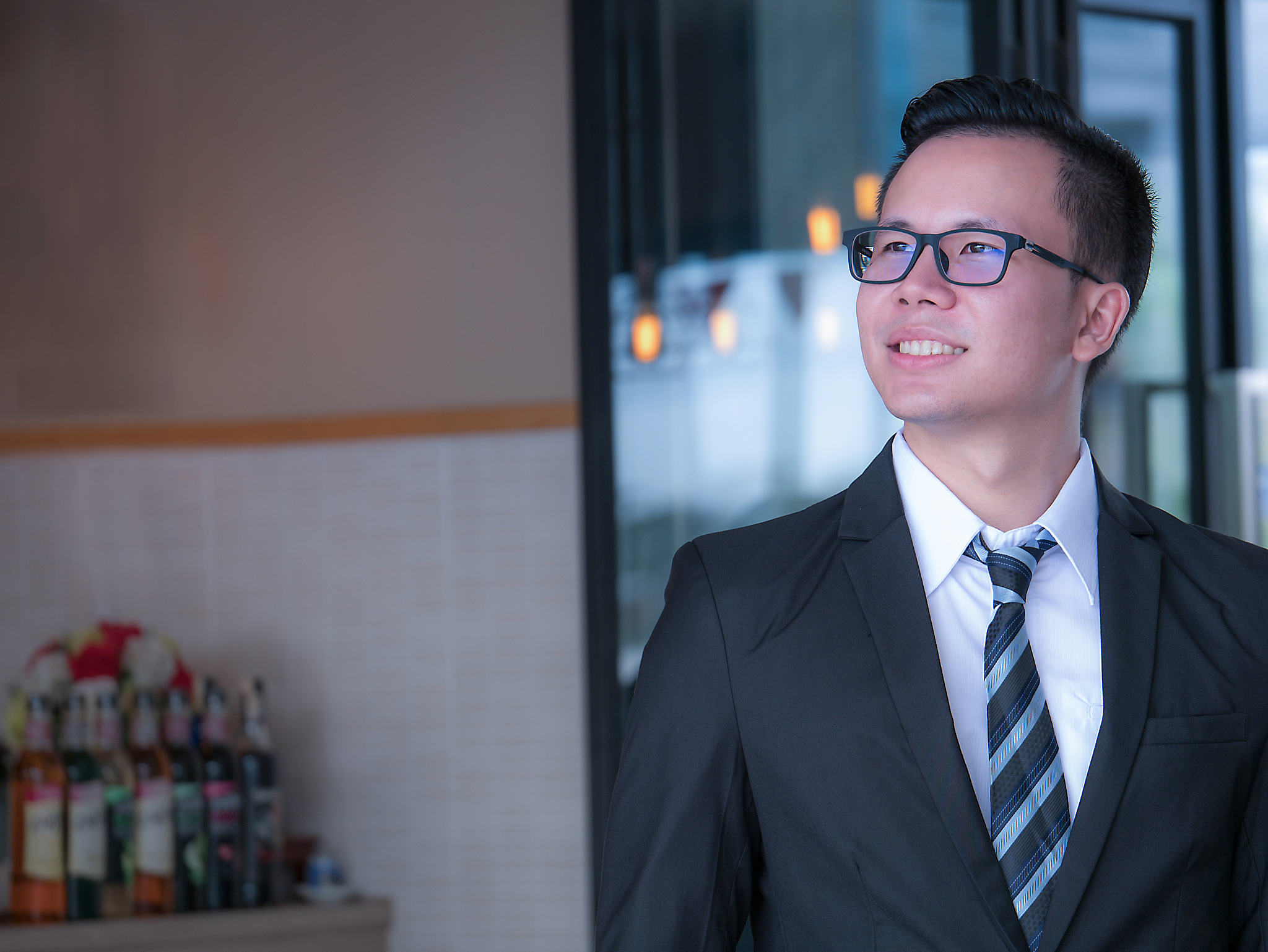 the asian young executive with a glasses, isolated on white back