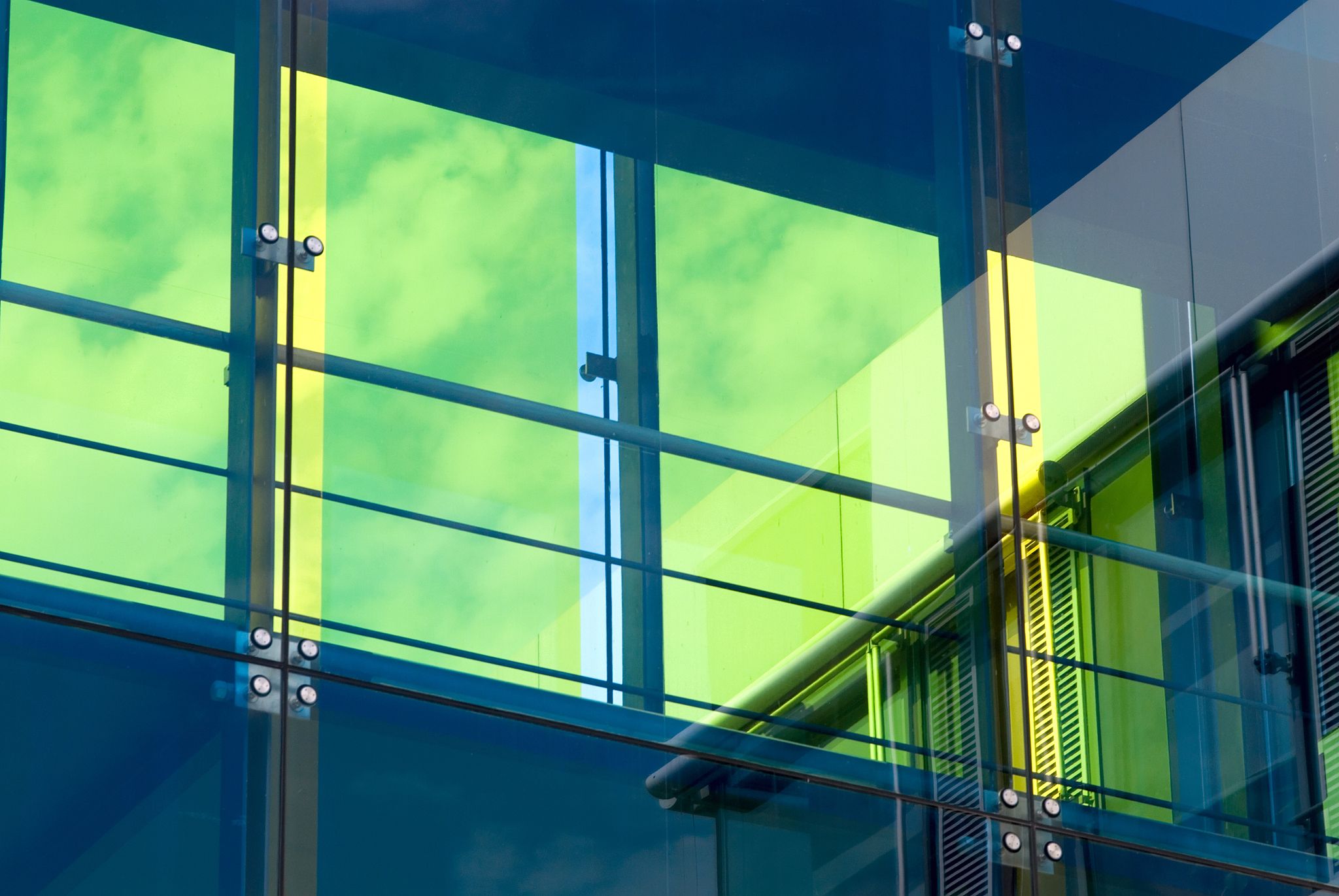 clouds, facade and sky mirroring in windows