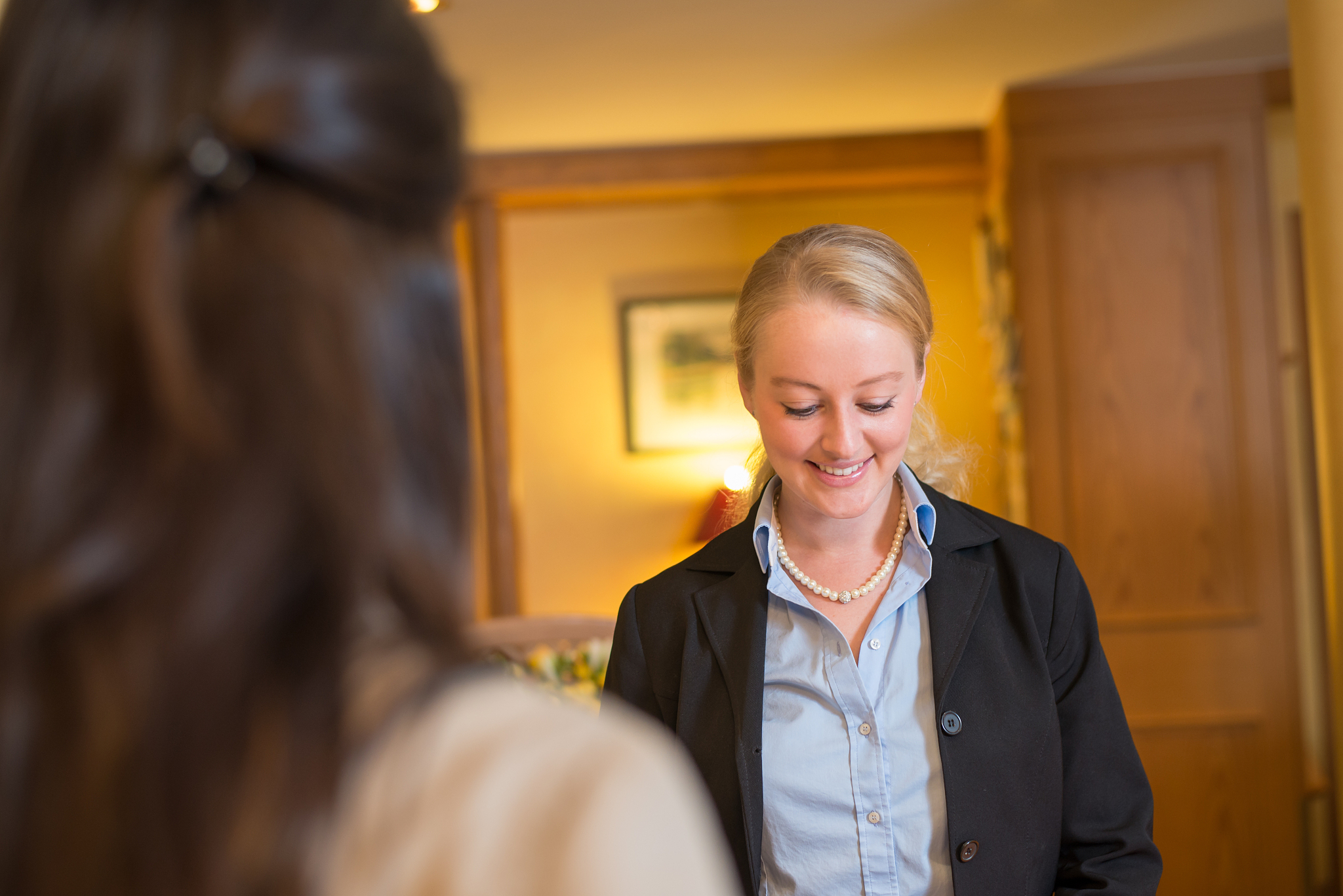 beautiful blond hotel receptionist