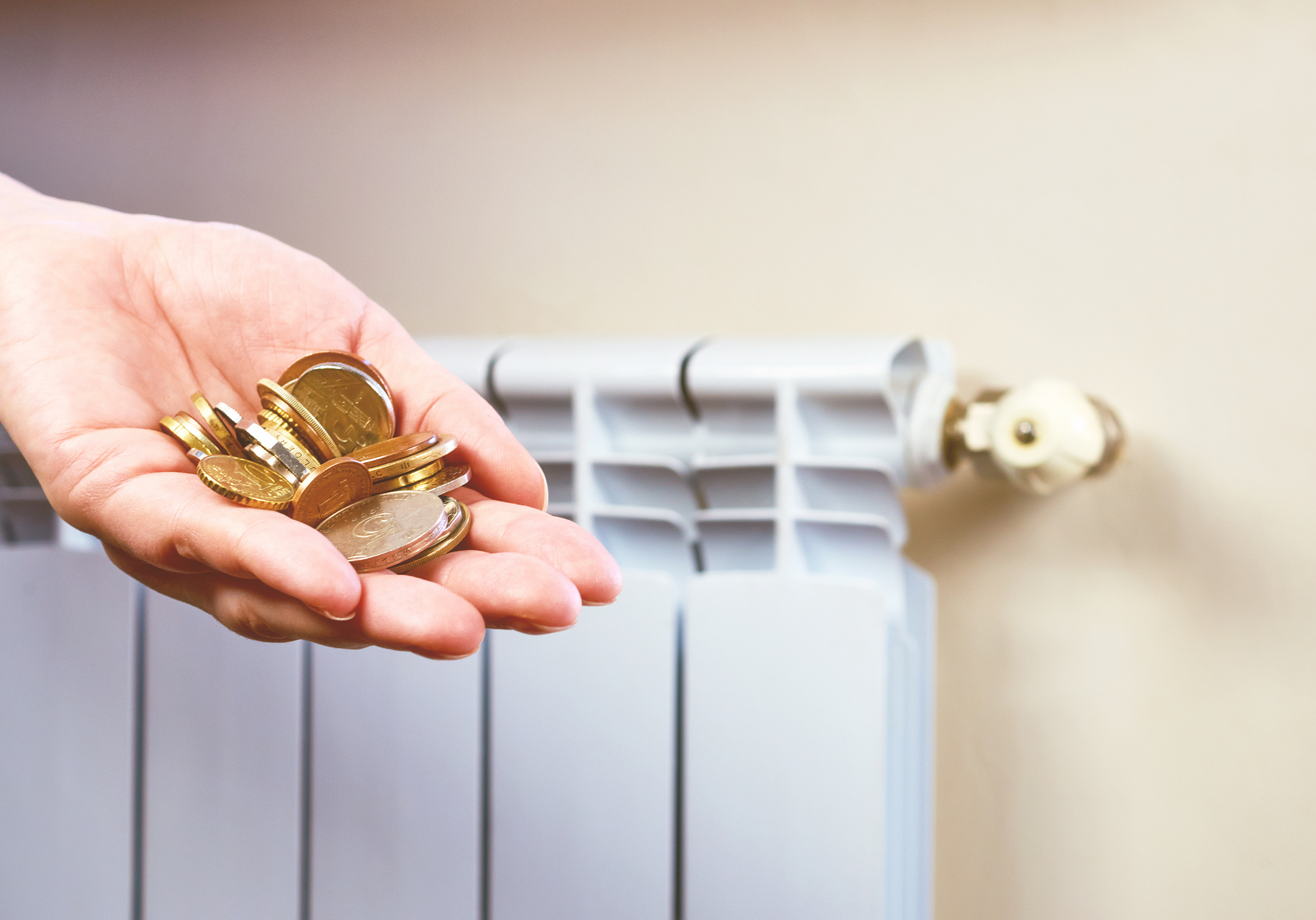 radiator adjustment to save energy. save energy and money concep