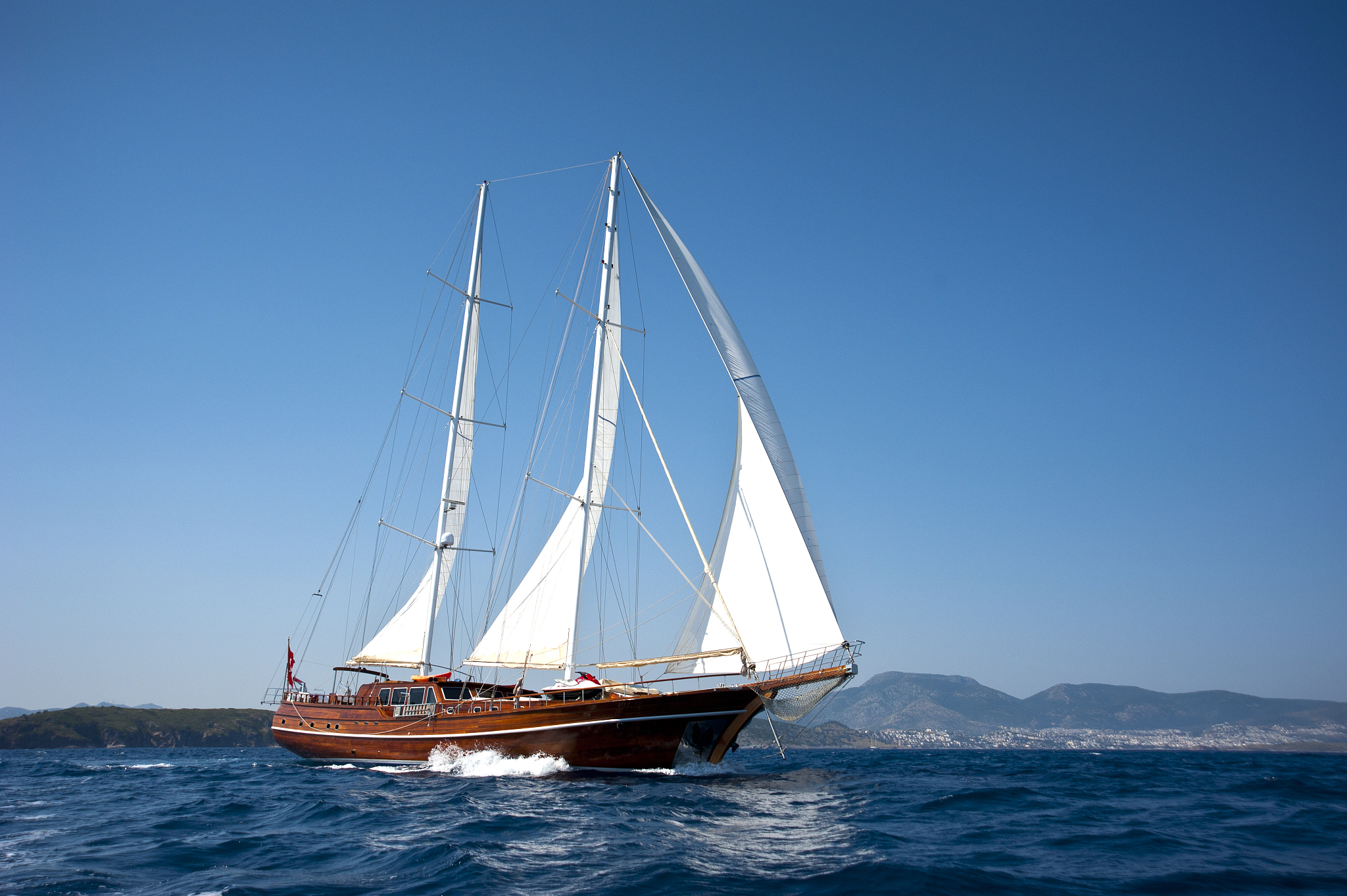 wooden yacht sailing