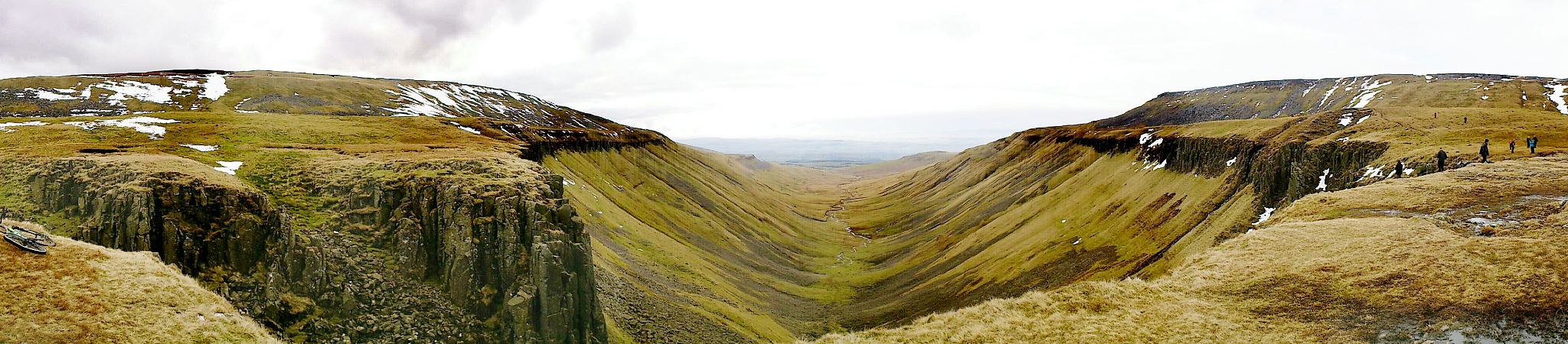 panoramic view of rock formations against sky