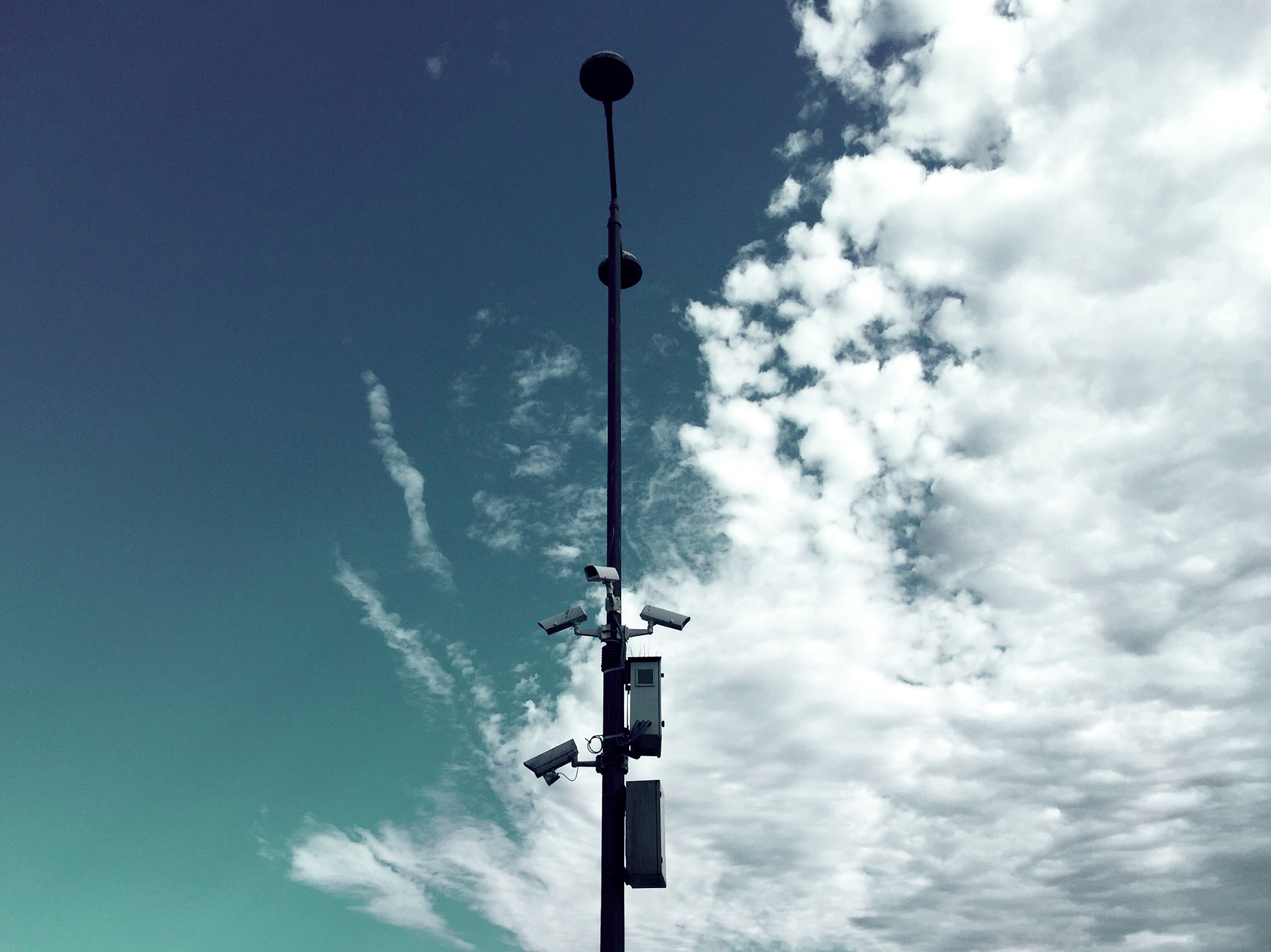 low angle view of street light against sky