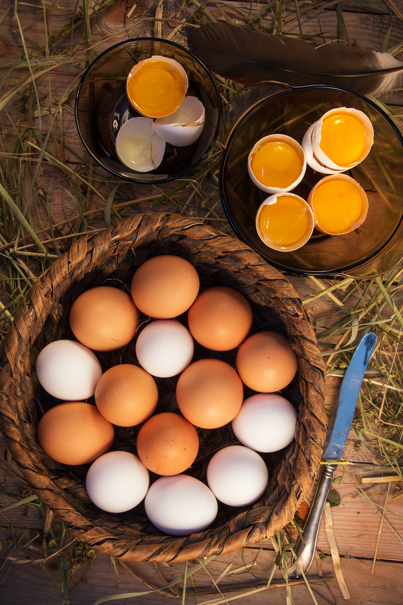 chicken eggs homemade  are in a wooden basket.