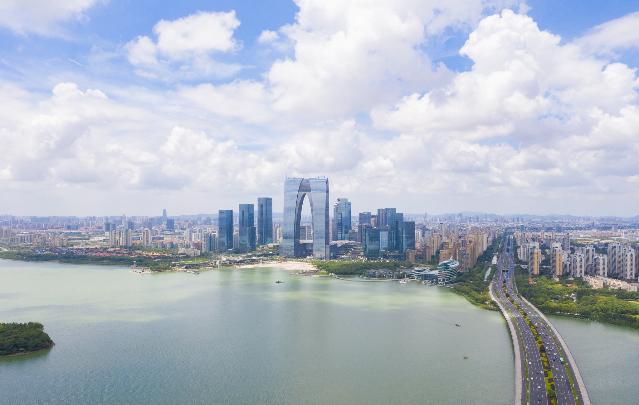 航拍苏州金鸡湖滨水现代城市风光