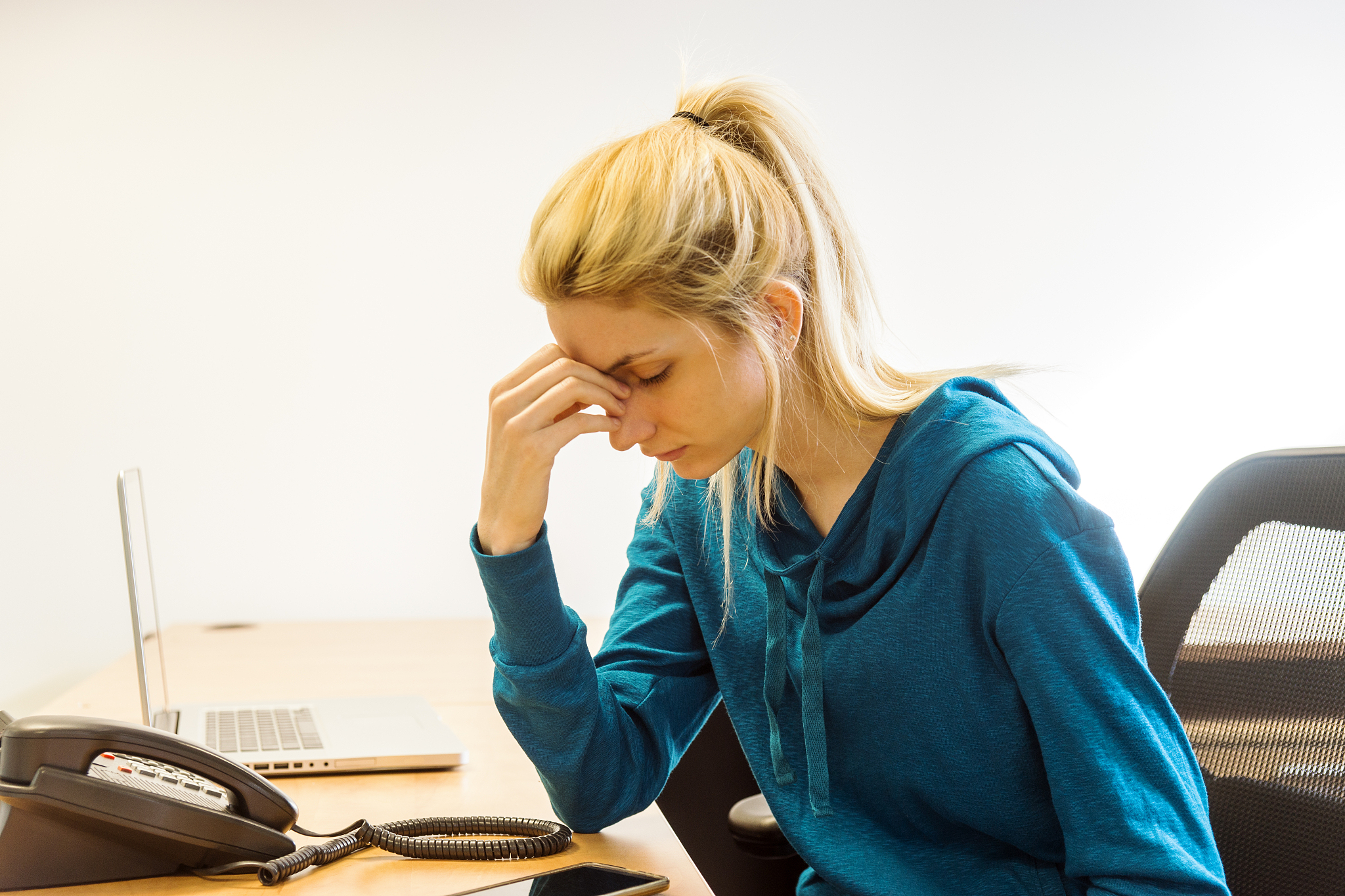 millennial at work stressed and upset