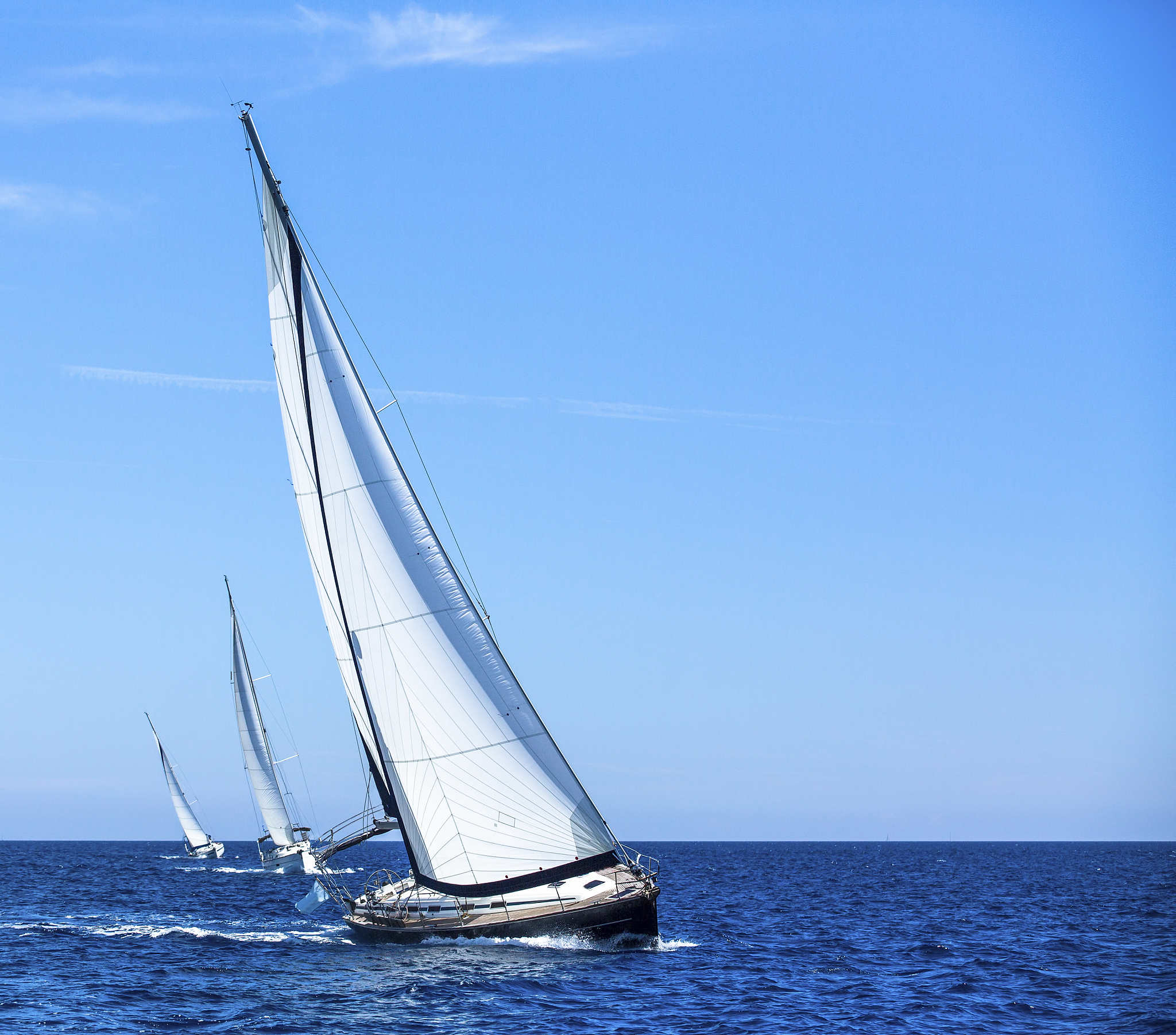 sailing in the sea. race cruising yachts.