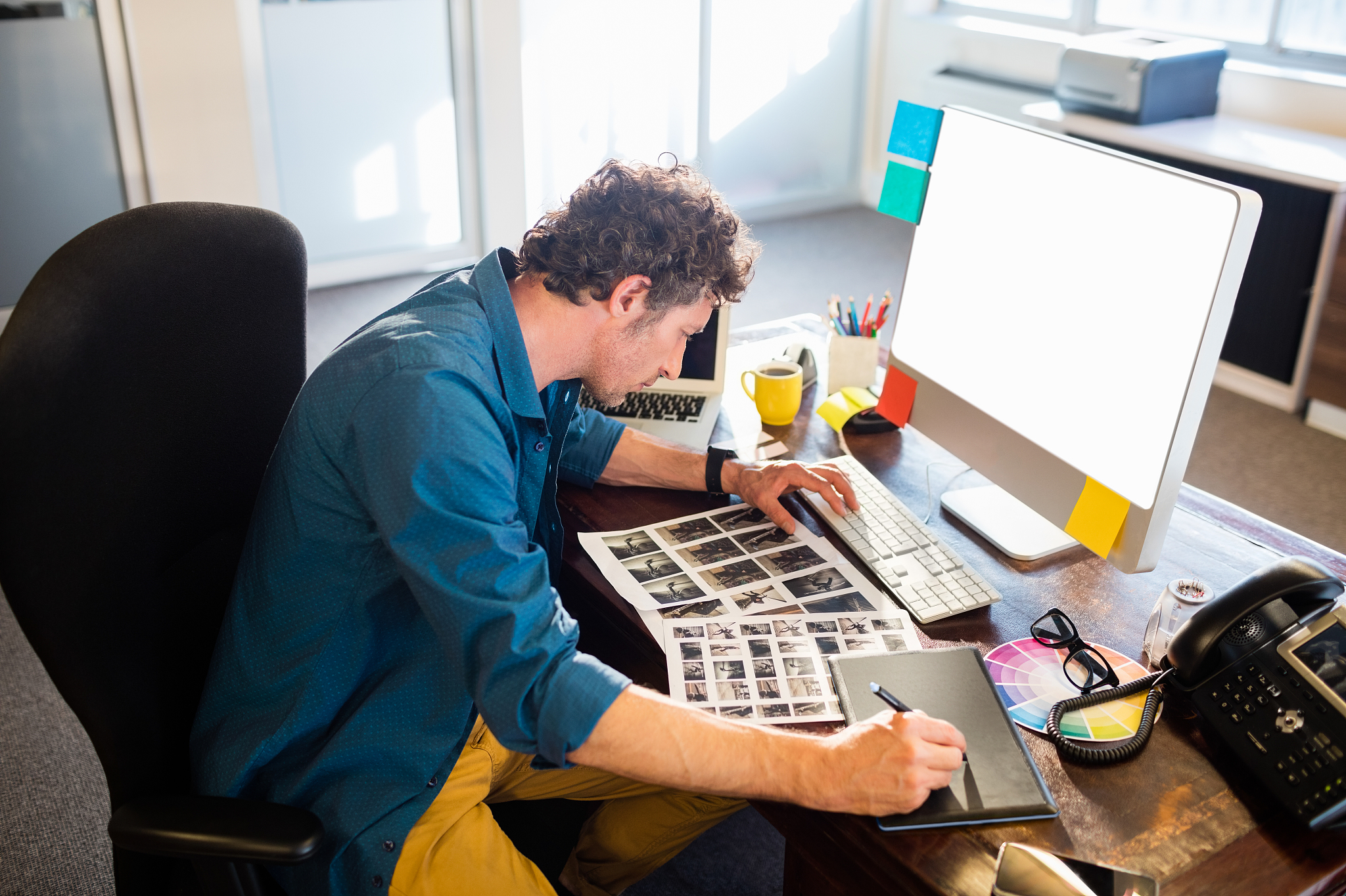 businessman using a graphing pad