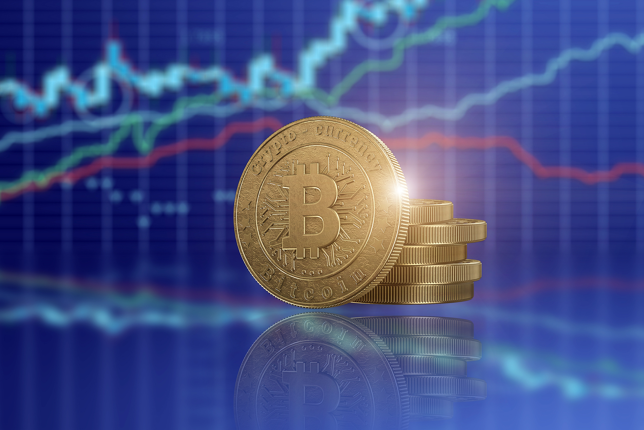 gold coin bitcoin on a background of business charts, blue backg