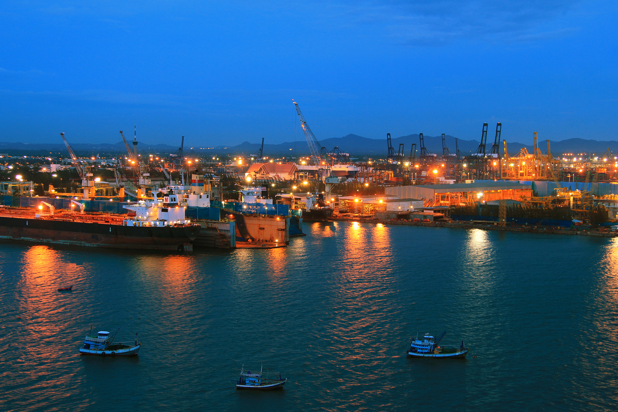 port warehouse with cargoes and containers